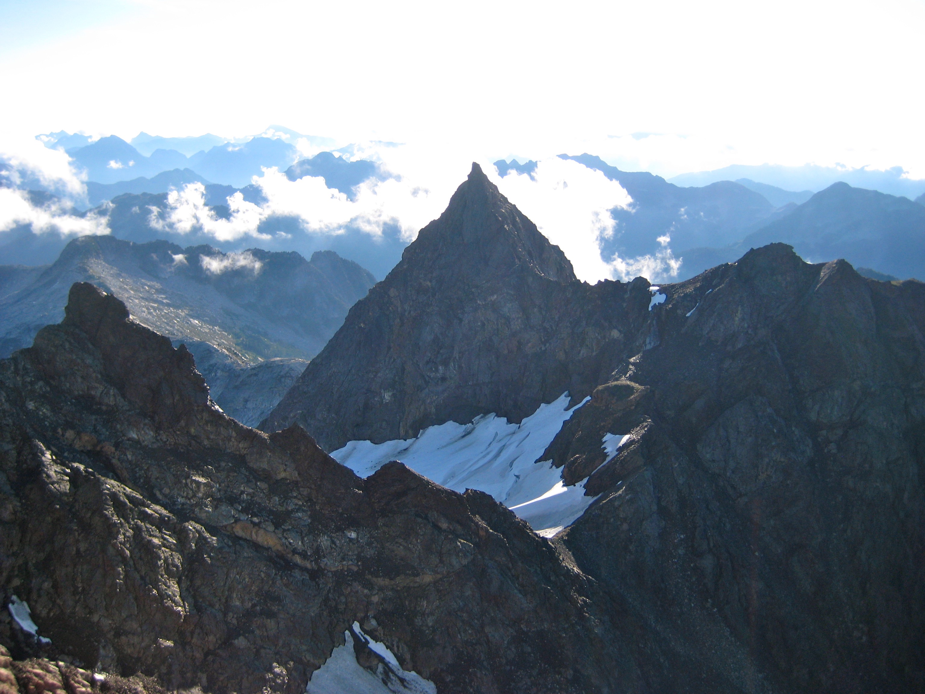 rock horn of Foley Peak as seen from Welch Peak in the Cheam Range