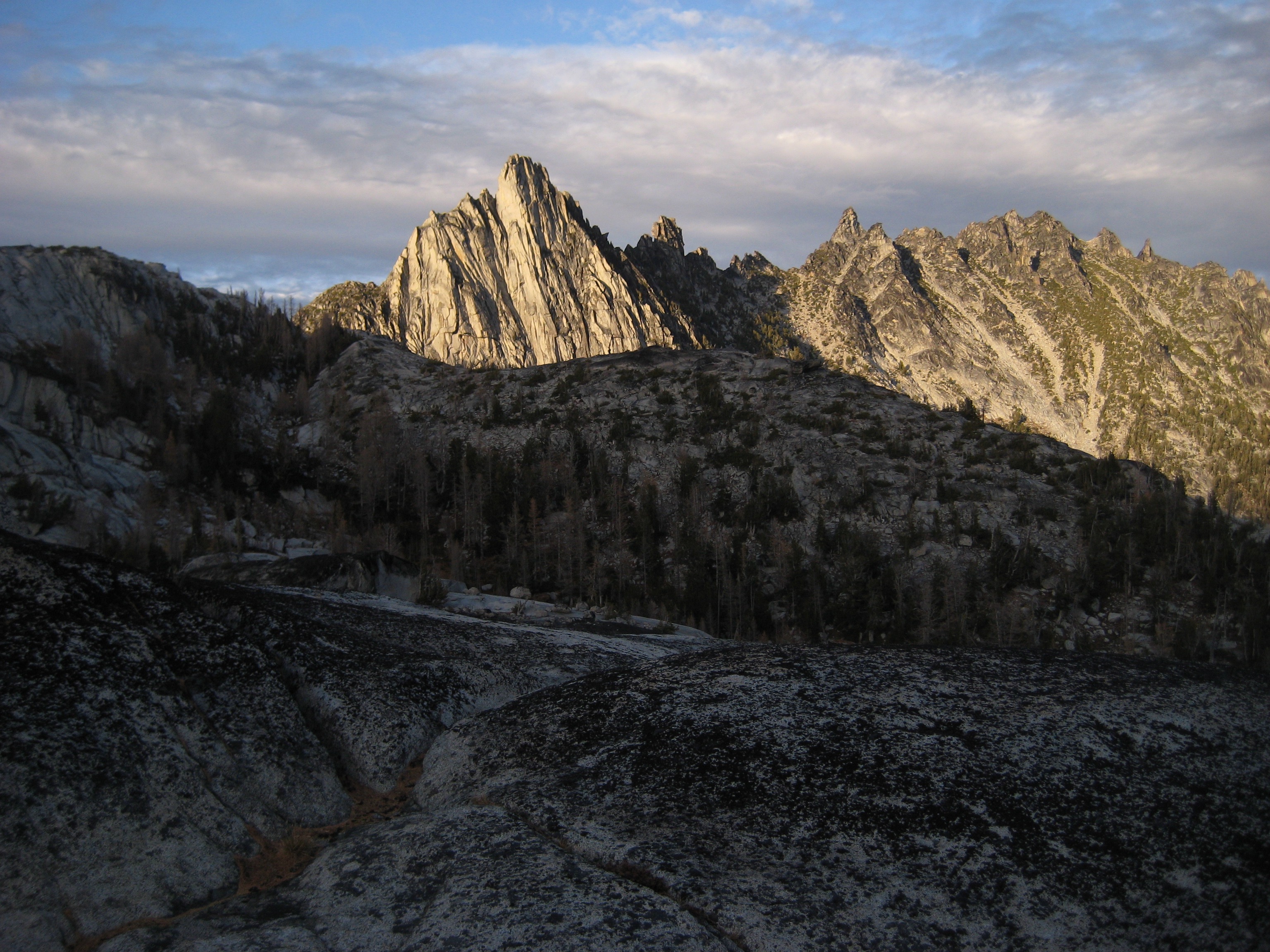 Evening sun lights up craggy granite Prusik Peak during Enchantment Traverse