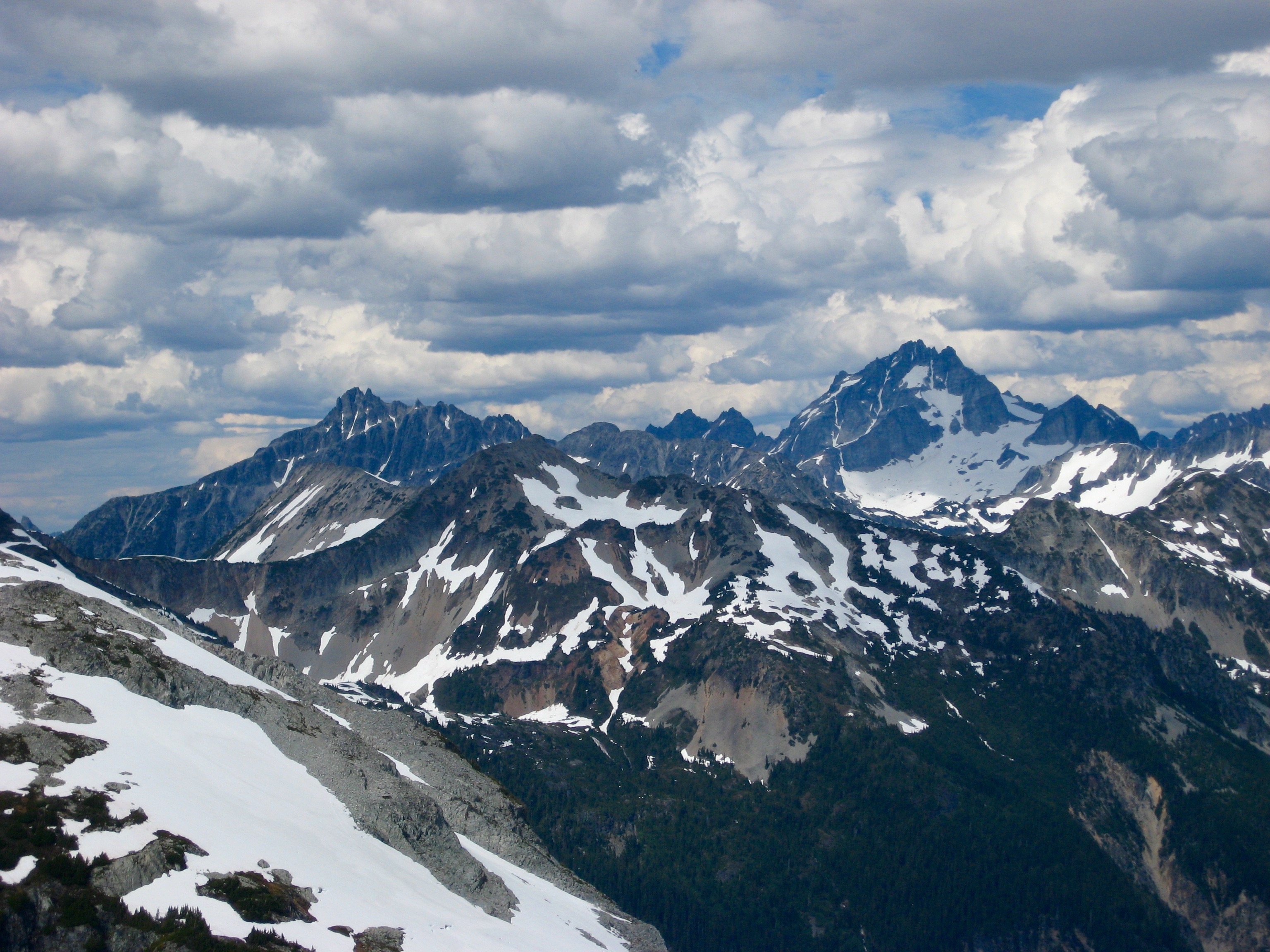 Distant view of Bear Mountain and Mt Redoubt in the Chilliwack Mountains as seen from the Challenger Glacier in the Northern Pickets