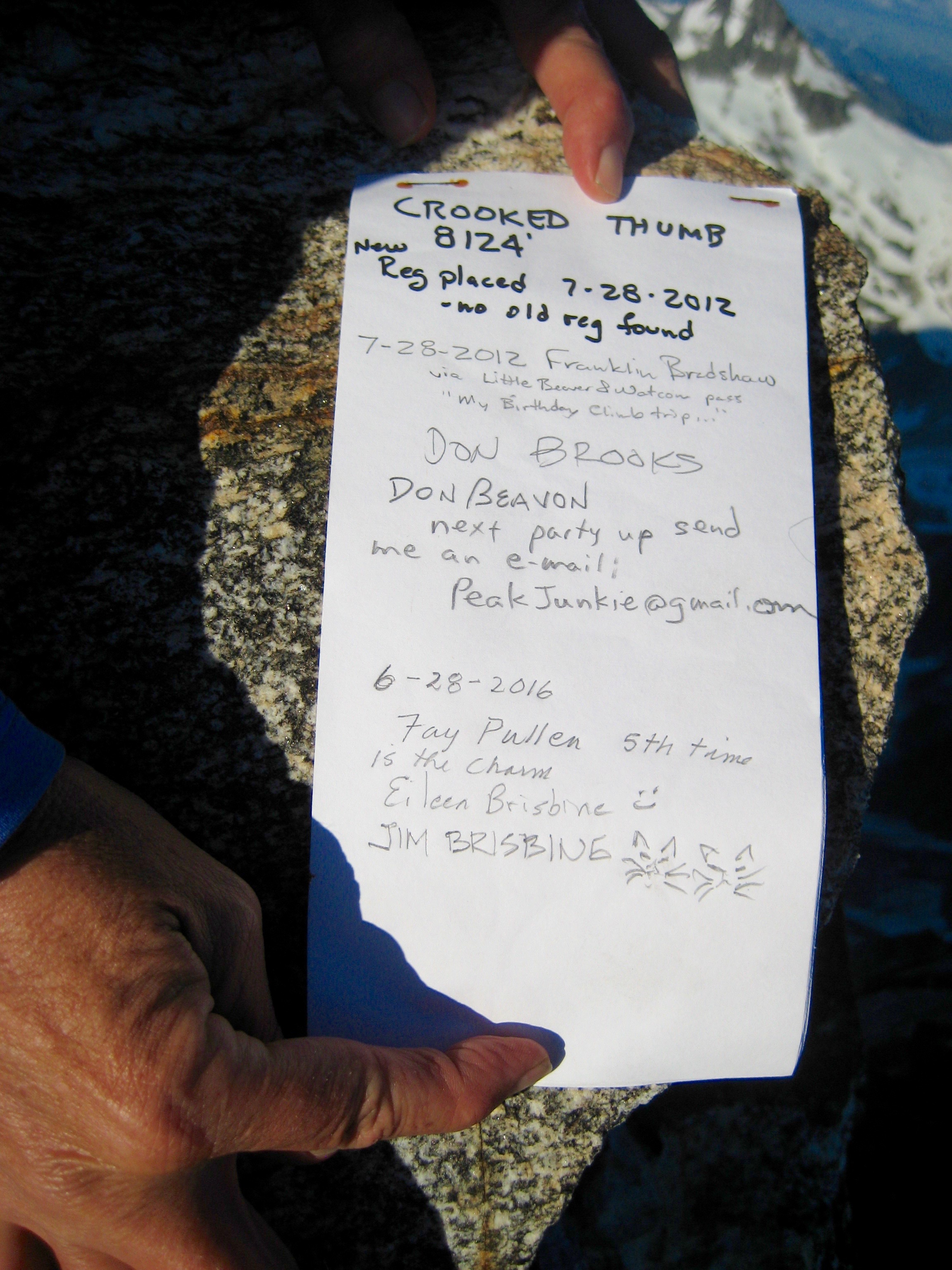 mountain climbers summit register for Crooked Thumb Peak in the Northern Picket Range