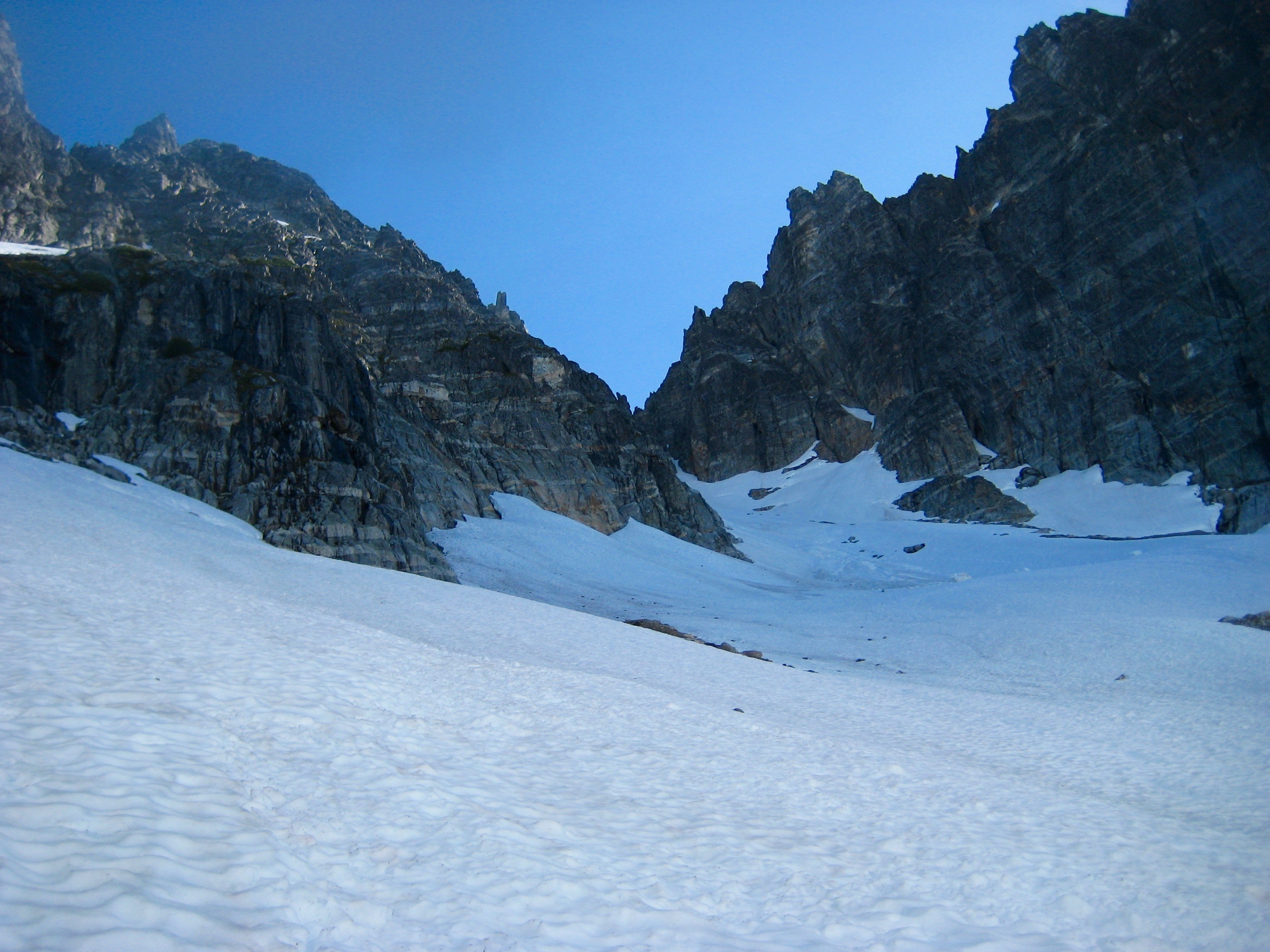 pocket glacier and sheer rock walls on Phantom Peak in the Northern Pickets