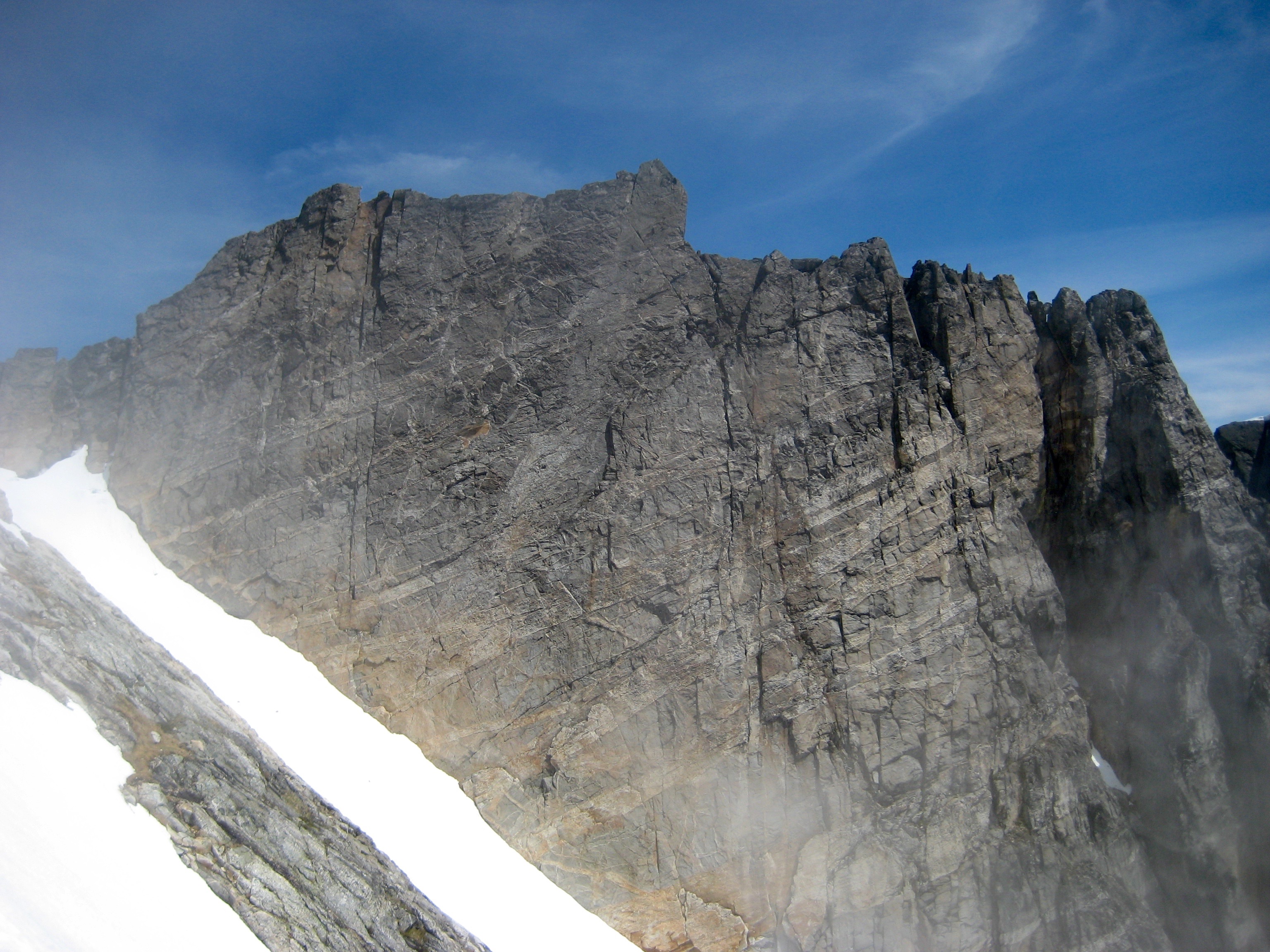 sheer rock cliff walls of Phantom Peak in the Northern Picket Range