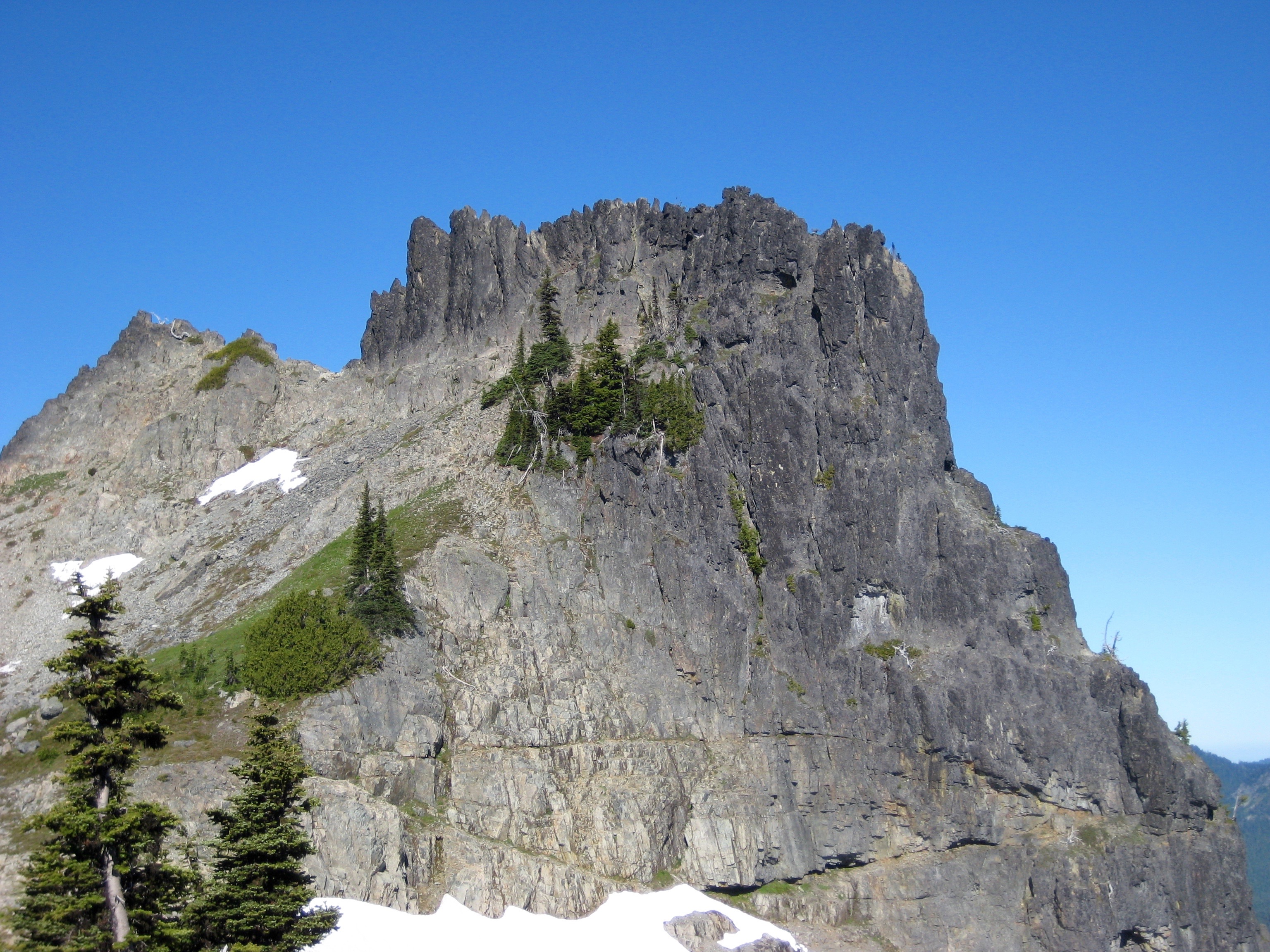 rocky pinnacles of the east face of The Castle on the Tatoosh Range in Mt Rainier National Park 