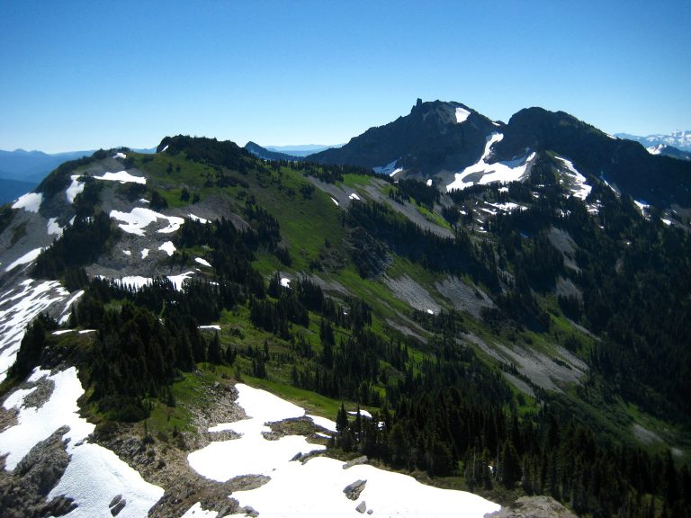 Looking across heather slopes at Unicorn Peak from The Castle in the Tatoosh Range in Mt Rainier National Park