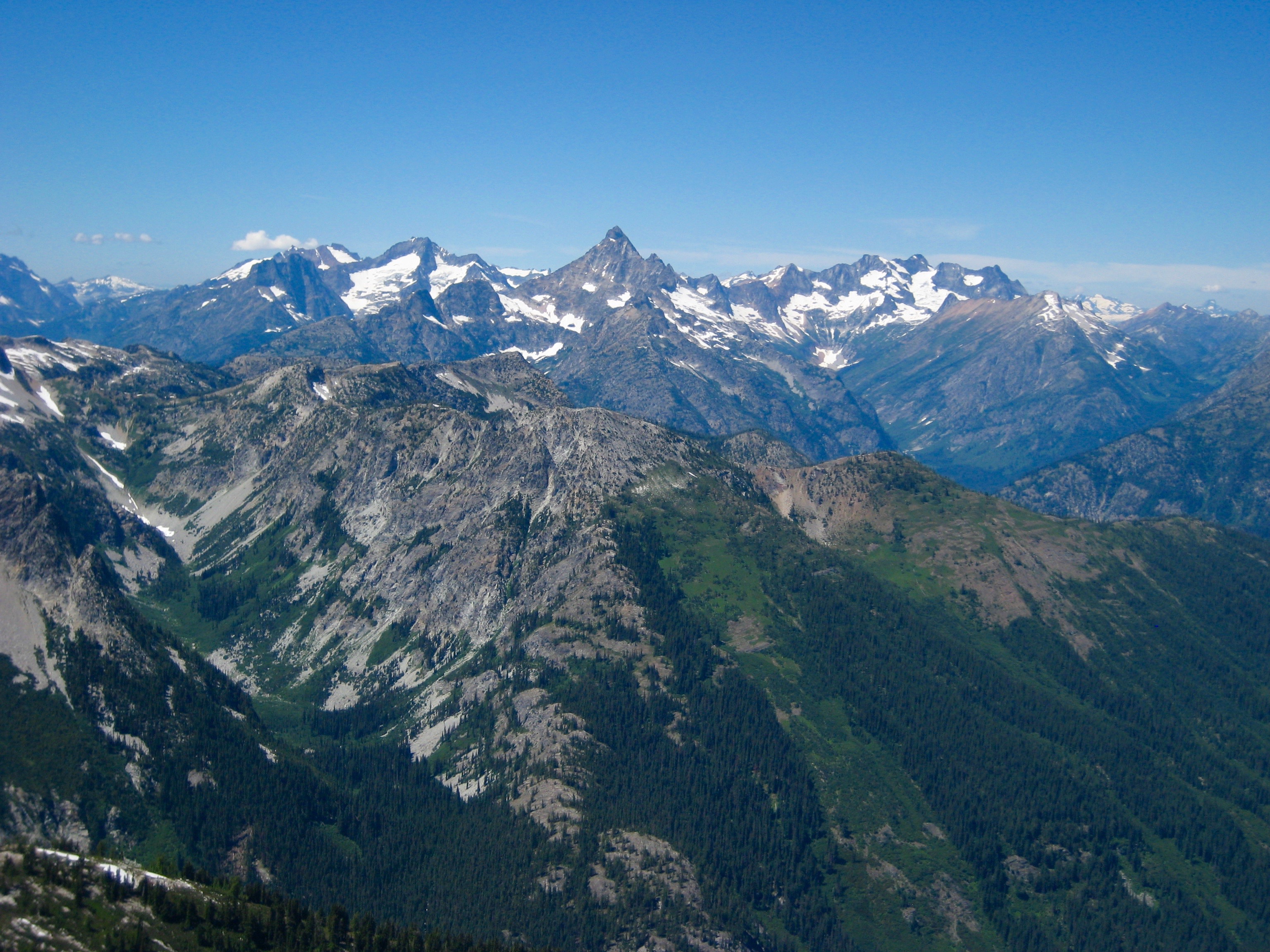 Mount Buckner, Mount Goode, and Mount Logan in the North Cascades as seen from the summit of Bowan Mountain in the Stehekin Mountains