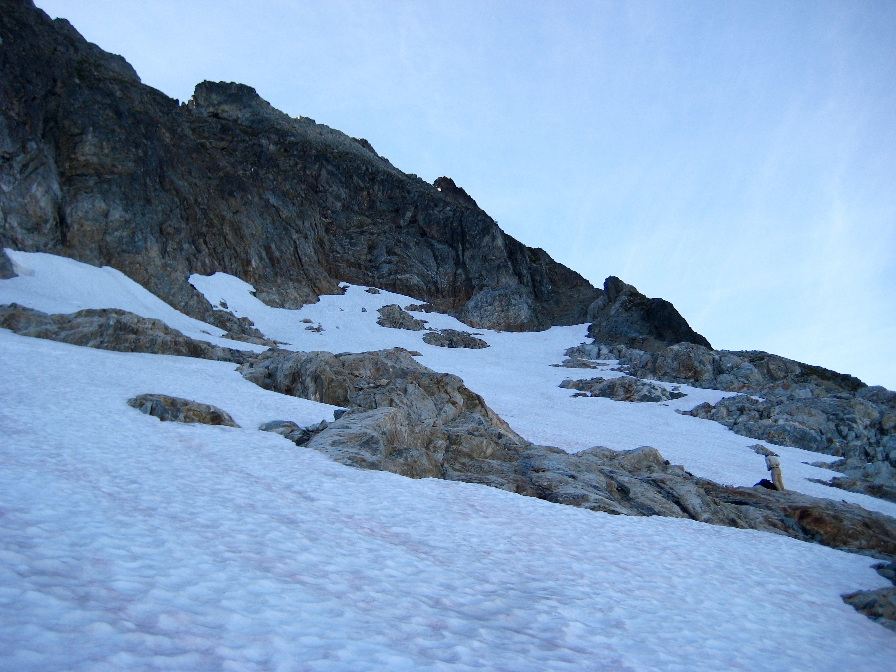 snow ramp leading through rocky slabs to Dougs Direct enroute to Johannesburg Mountain in North Cascades National Park