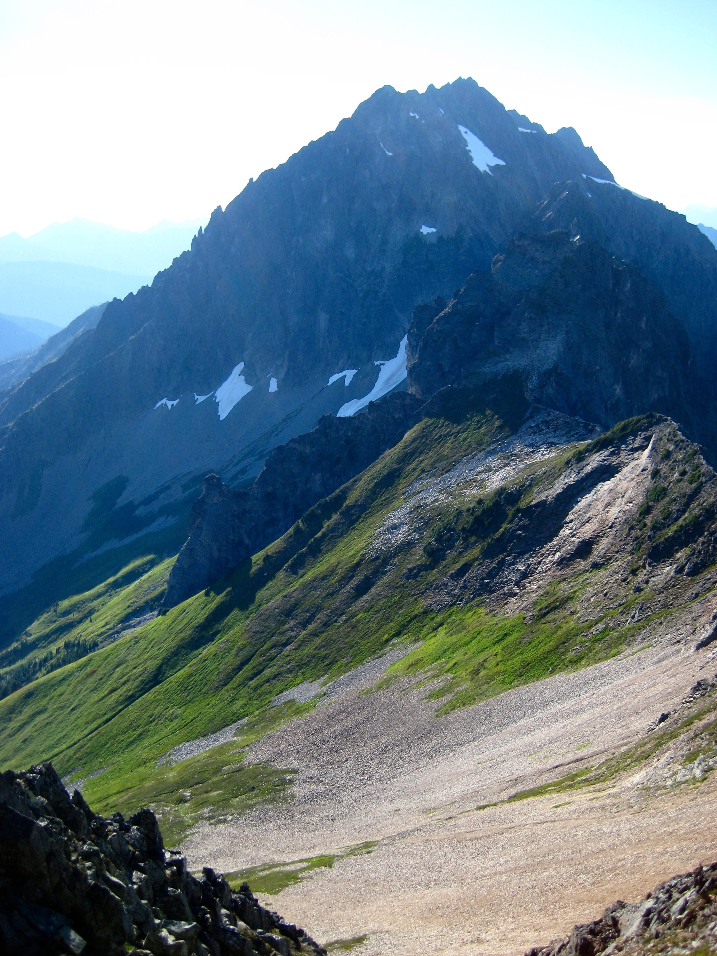 Johannesburg Mountain in the evening light with the long scree and grass traverse as seen from North Mixup Notch in North Cascades National Park