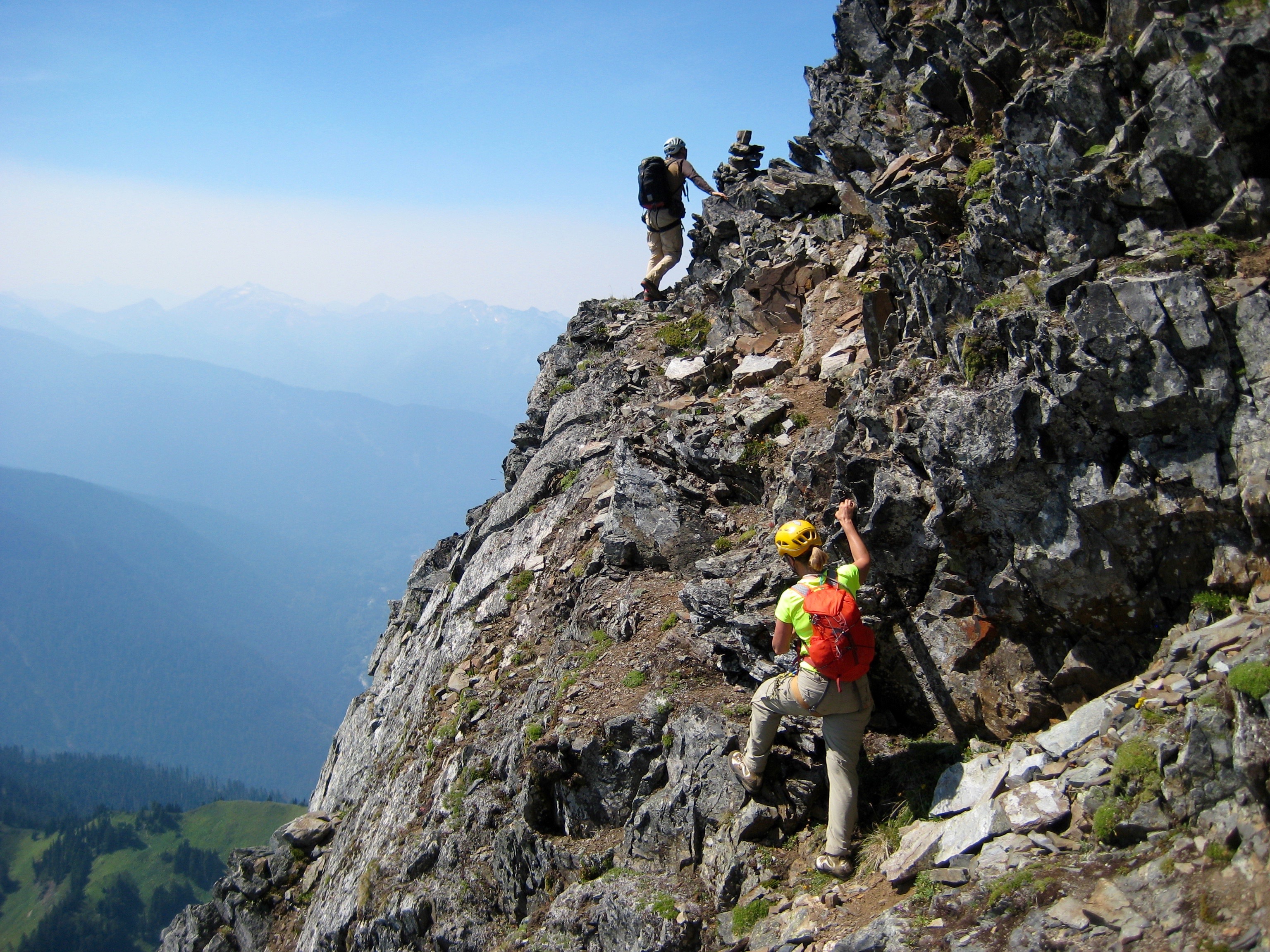 mountain climbers traversing south ridge ledges leading to Johannesburg Mountain true summit in North Cascades National Park
