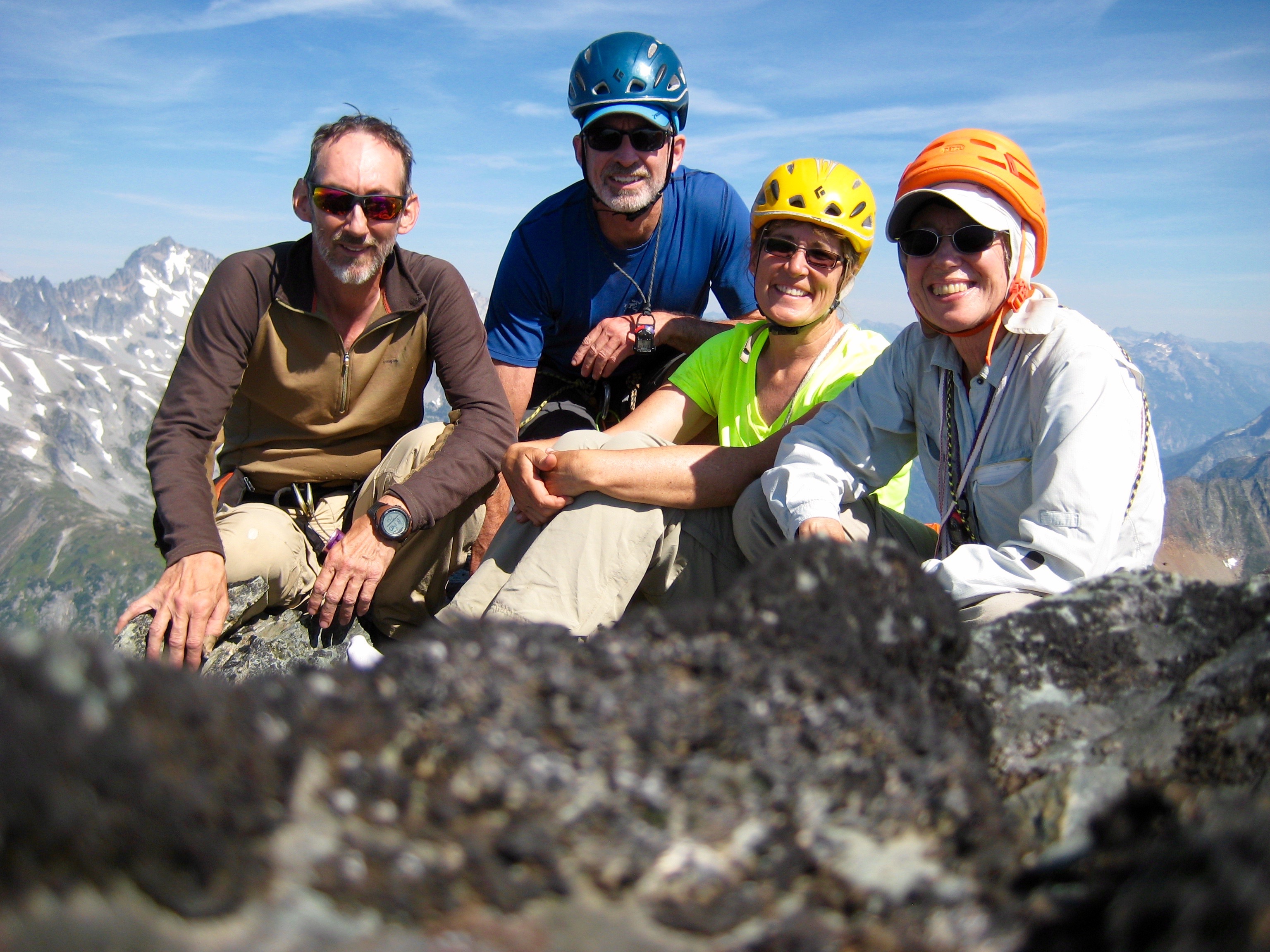 mountain climbers on the rocky, summit of Johannesburg Mountain in North Cascades National Park
