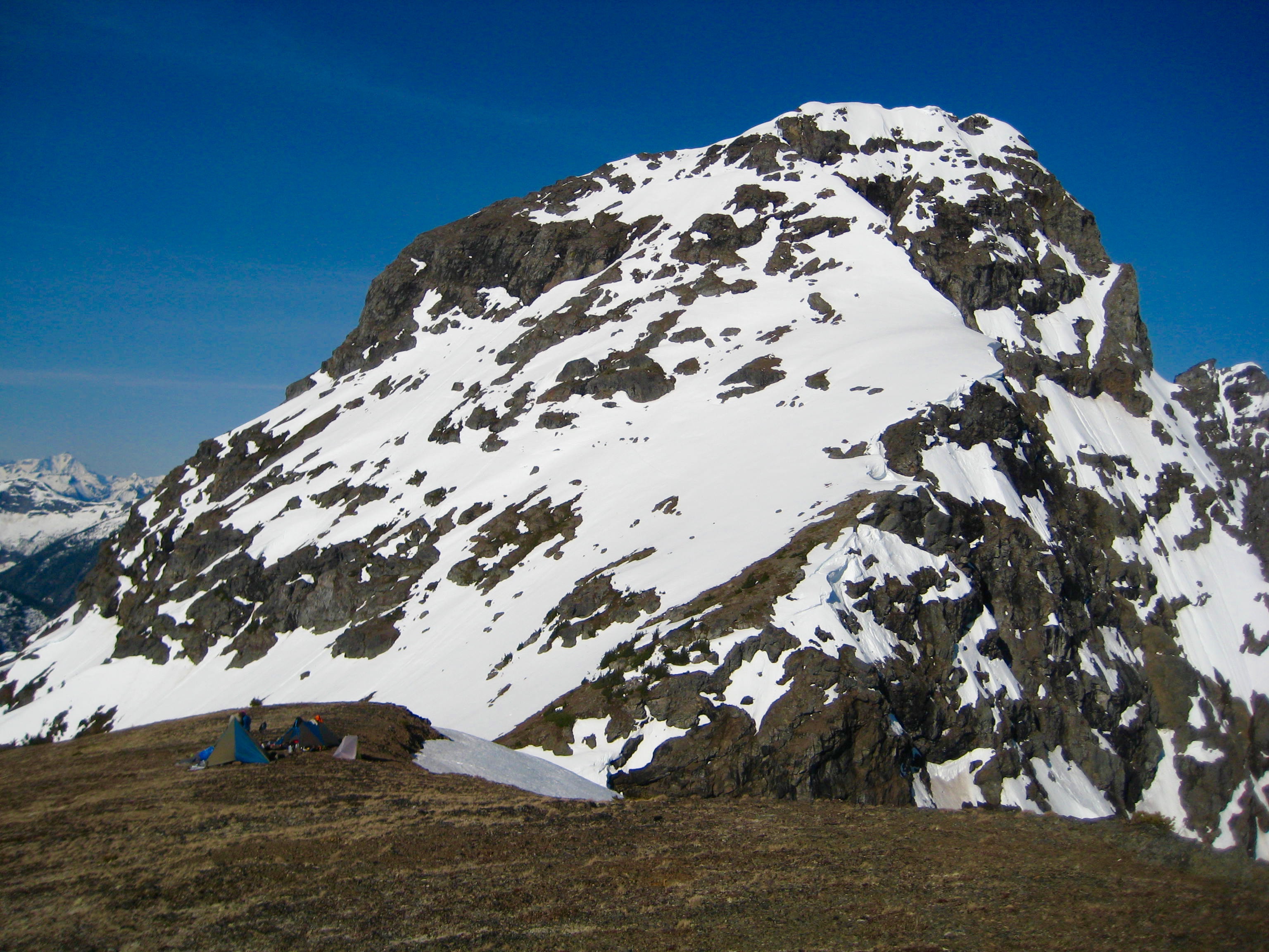 Mt Rideout with patchy snow above climbers camp in the Sumallo Mountains BC Canada