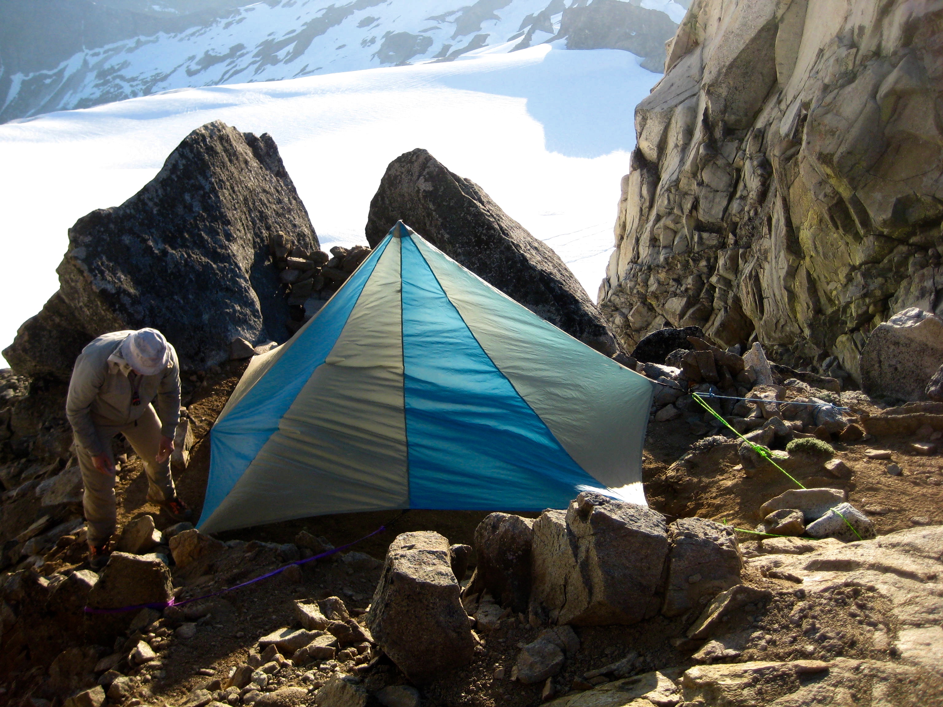 mountain climber's camp in the rocks at the Chikamin-Dome Col in the Ptarmigan Mountains