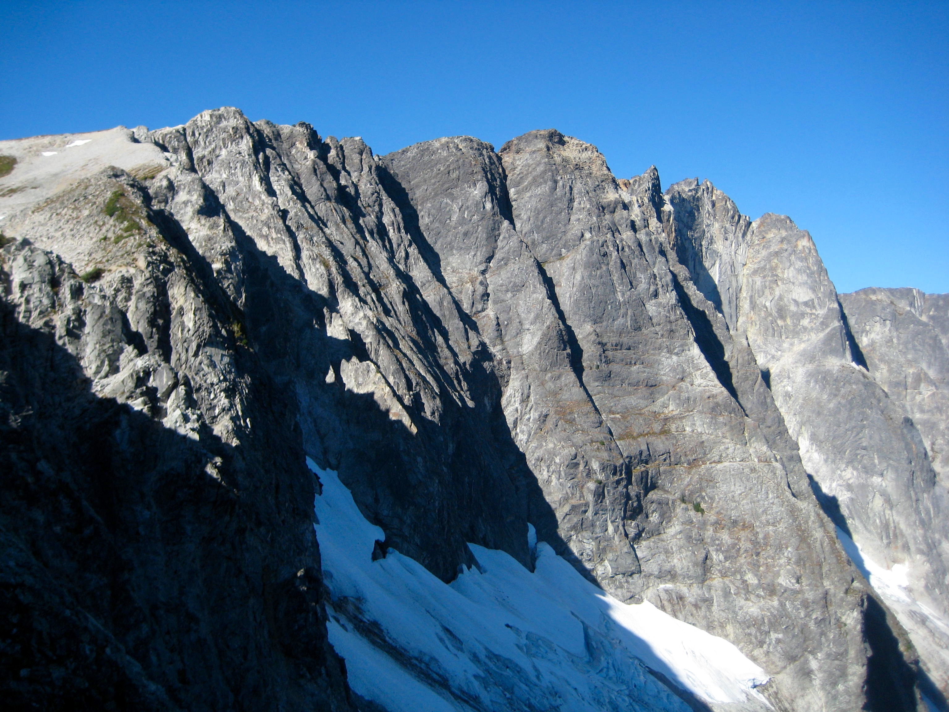 North Face Of Bear Mountain with linguring snow patches in the American Chilliwack Mountains