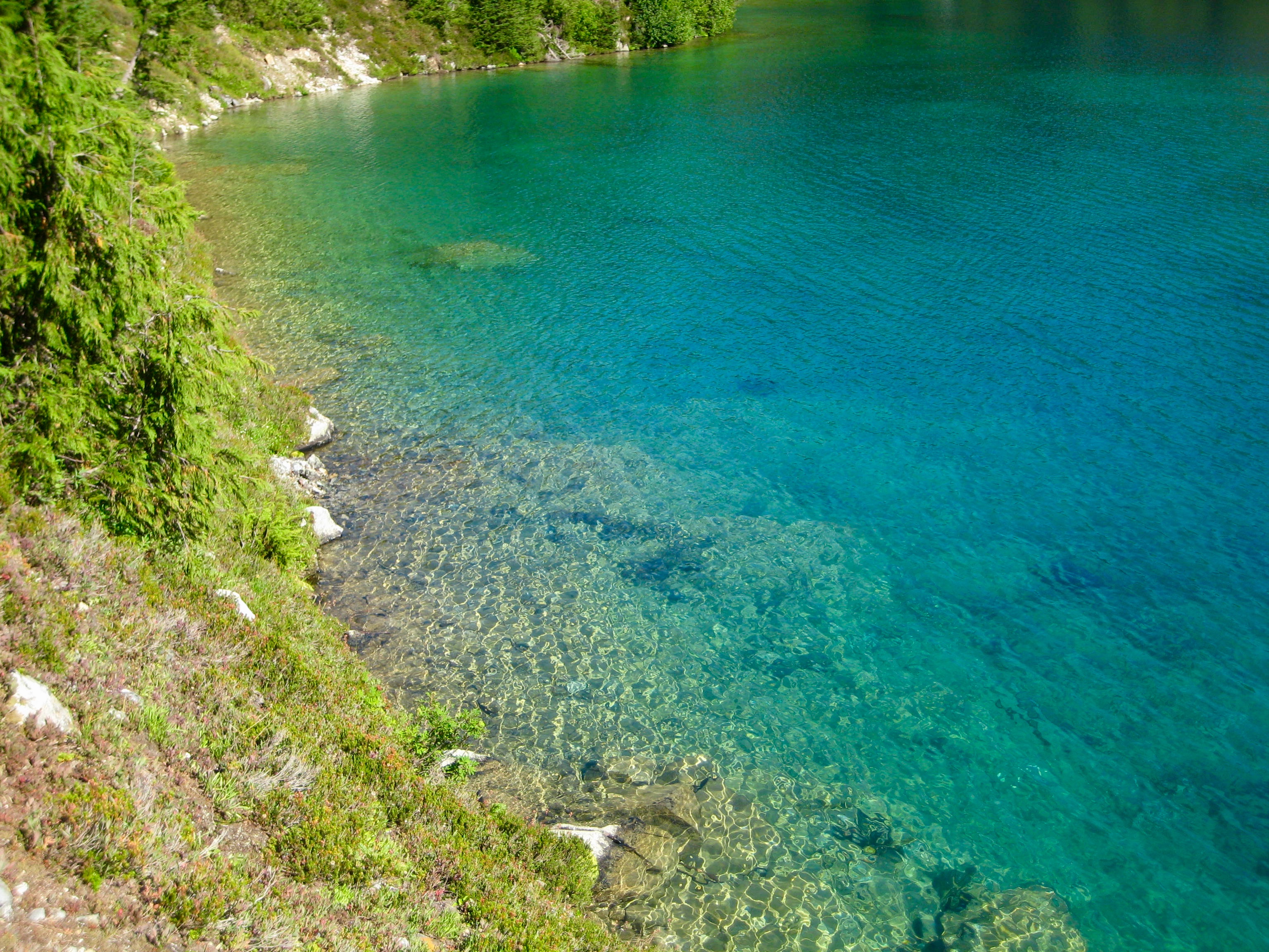 aqua blie water in Lower East Lake in the American Chilliwack Mountains