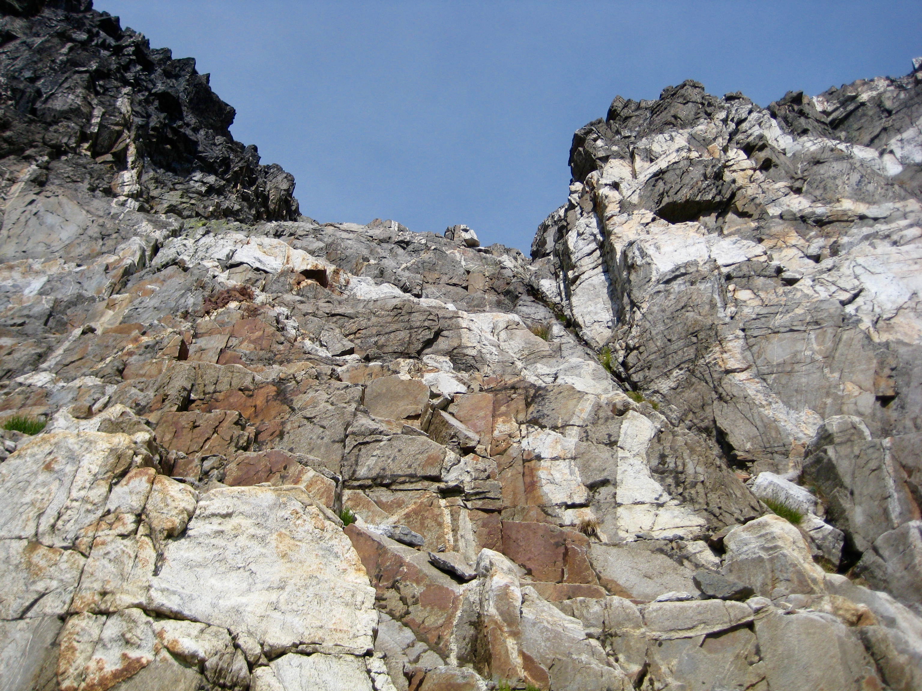 steep crux rock face of Sitting Bull Mountain in the Glacier Peak Wilderness