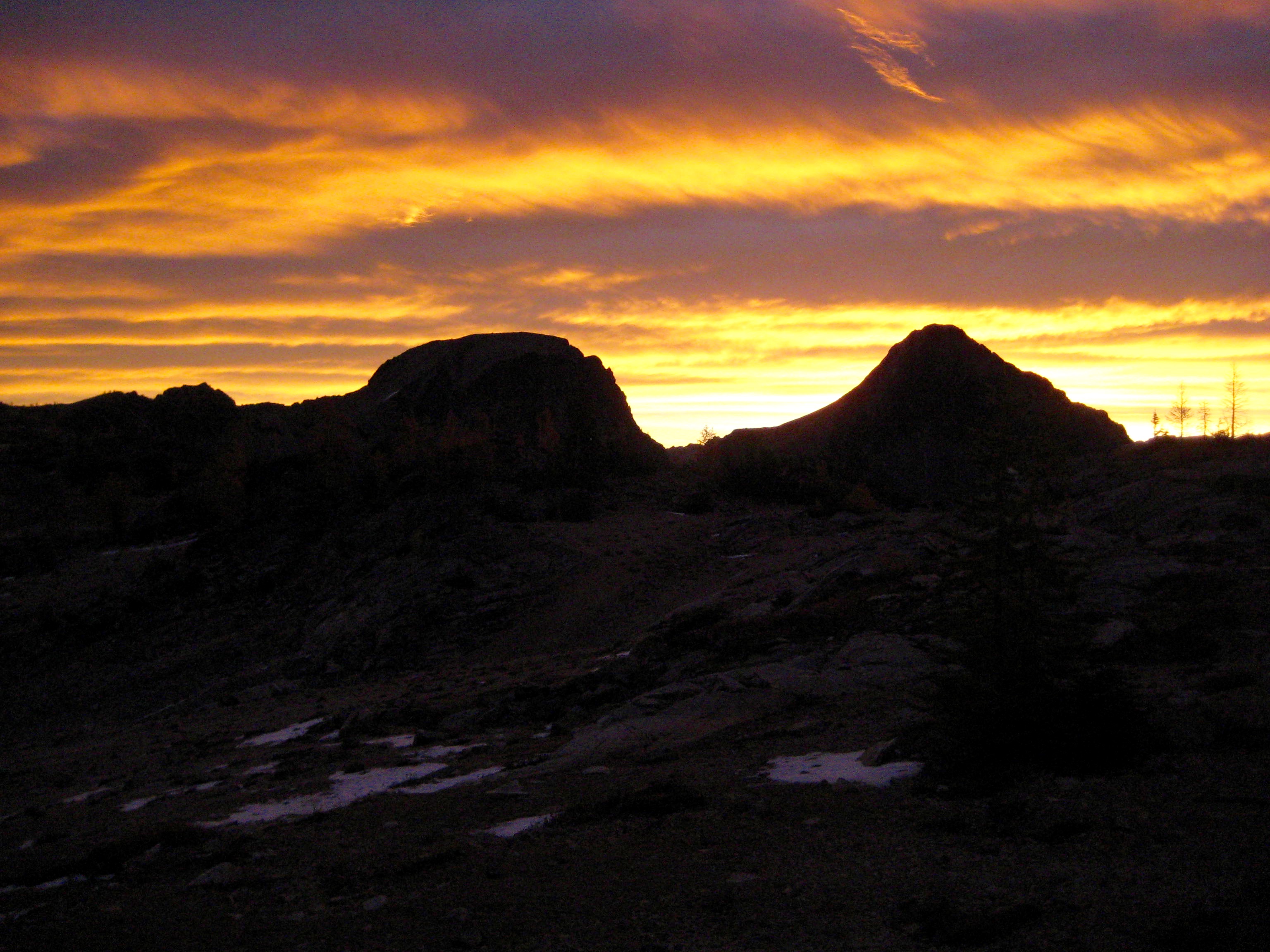 sunrise over North and South Spectacle Buttes as seen from Upper Ice Lakes in the Entiat Mountains