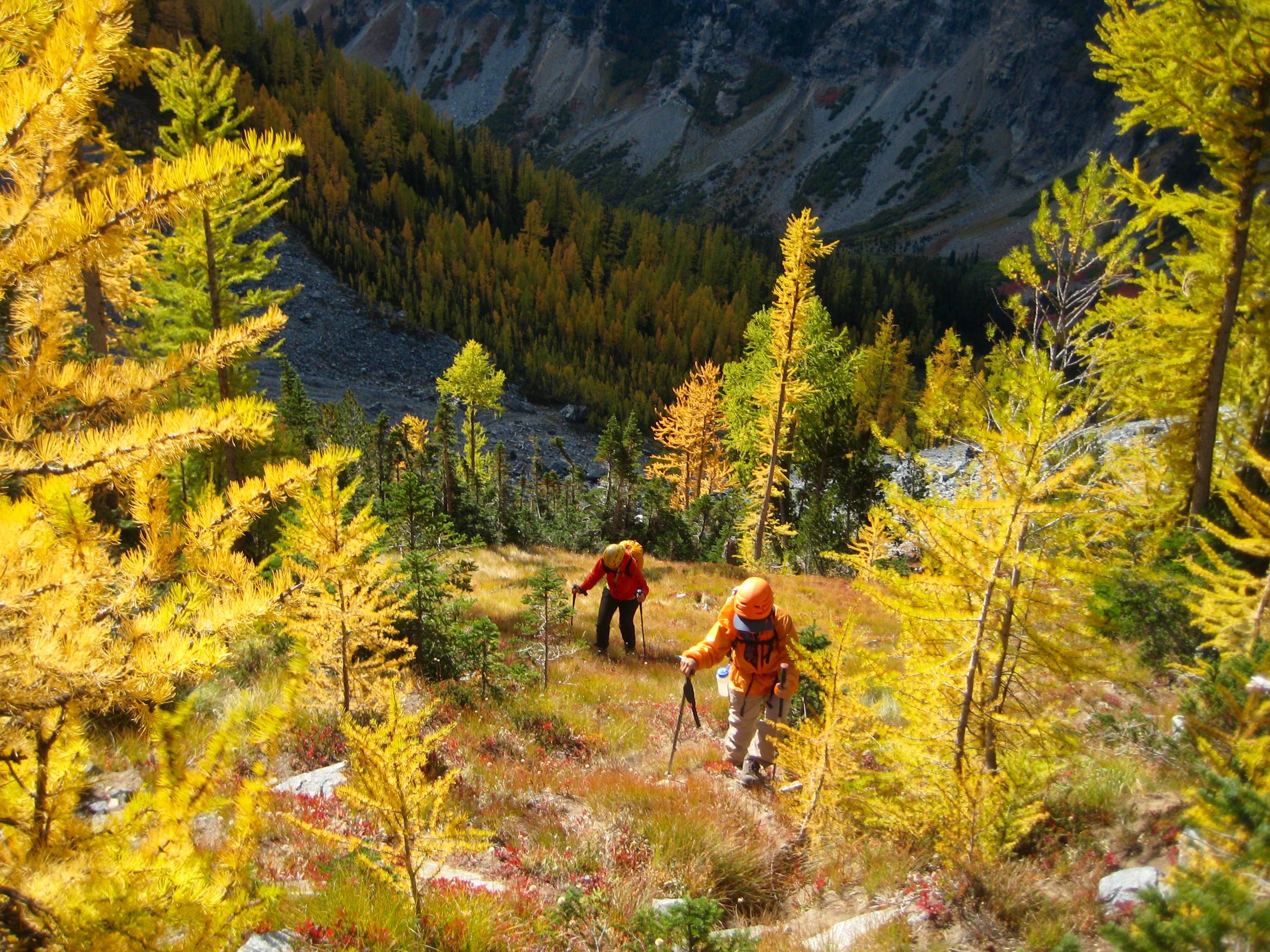 mountain climbers scrambling up toward South Spectacle Butte Col
