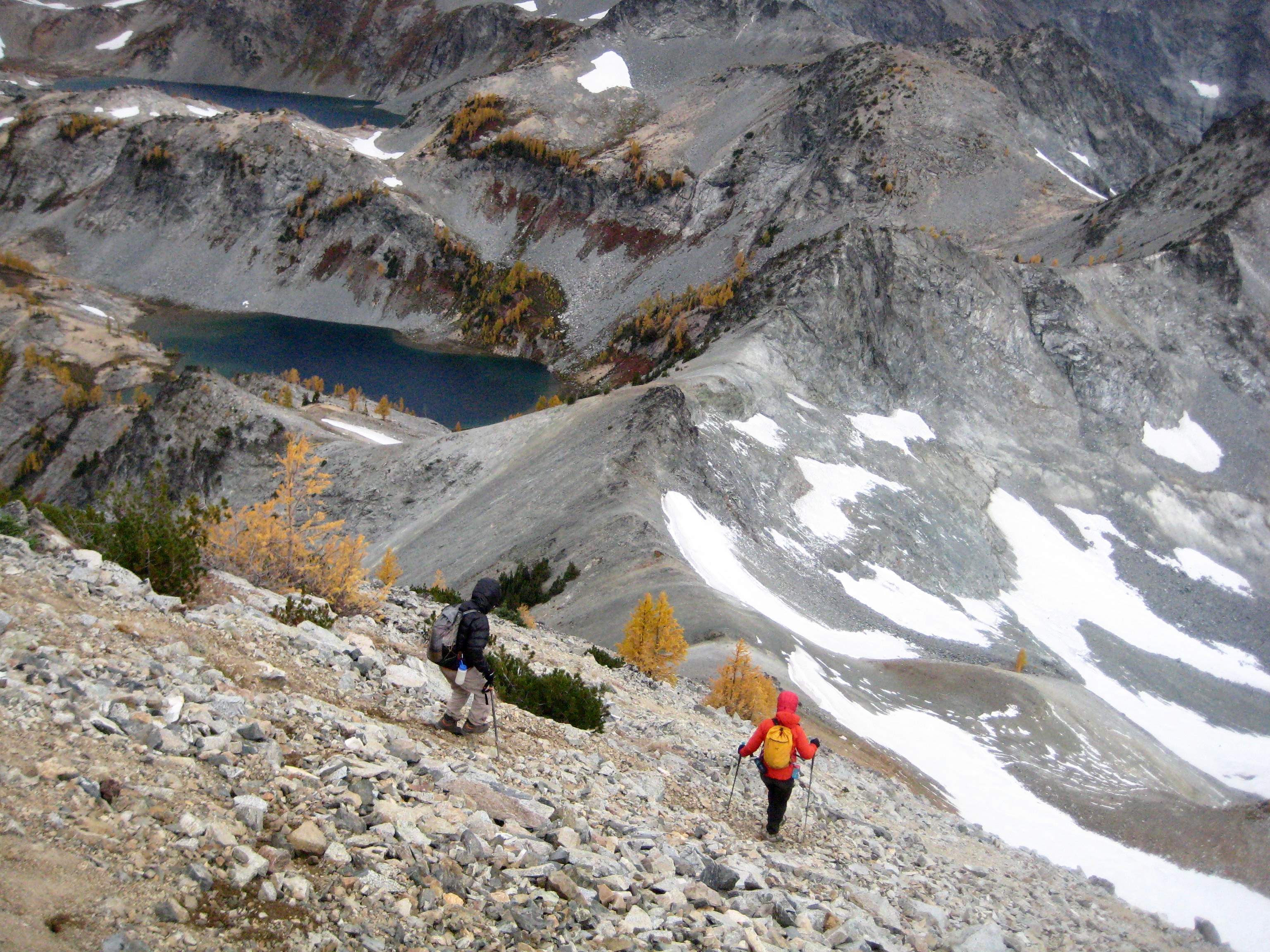 mountain climbers descending scree slope on North Spectacle Butte