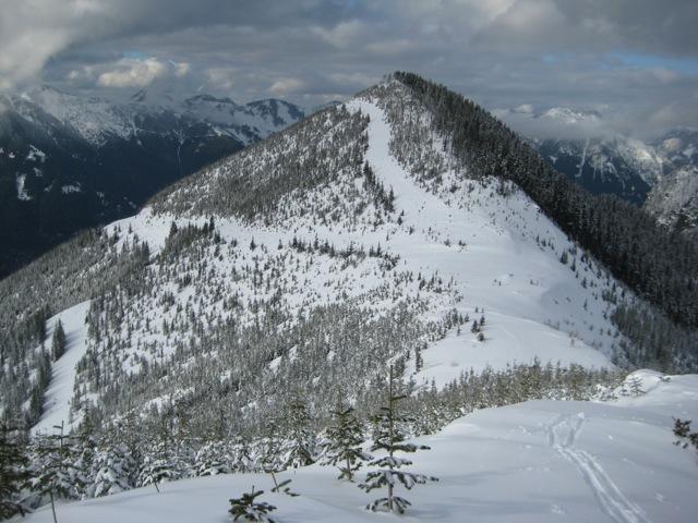 Looking over at snow covered Zorro Peak with a Z shaped road