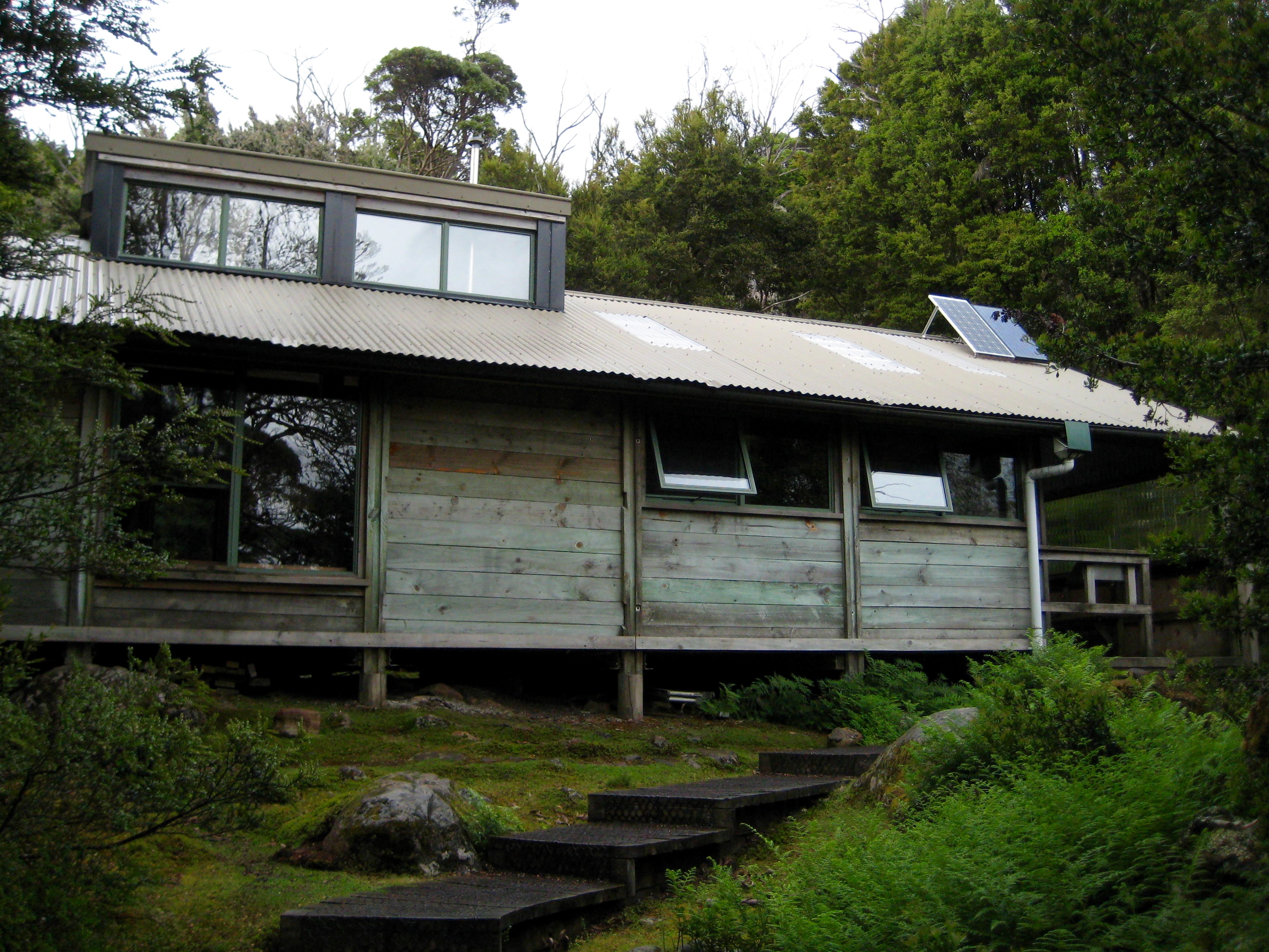 hikers Arriving At Windermere Hut On Day 2 of the Overland Track traverse