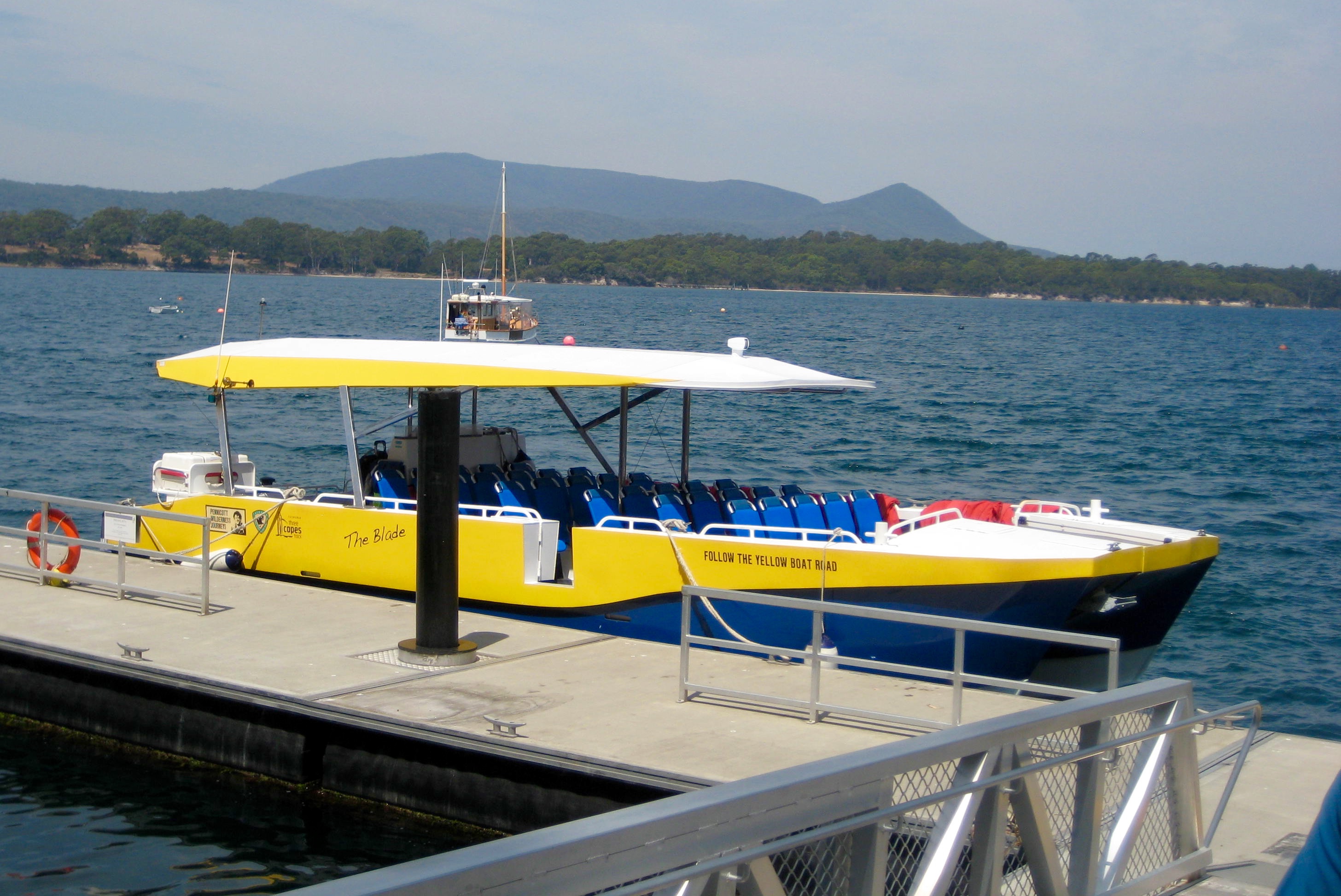 Port Arthur Tour Boat tied to the dock on the Port Arthur Bay