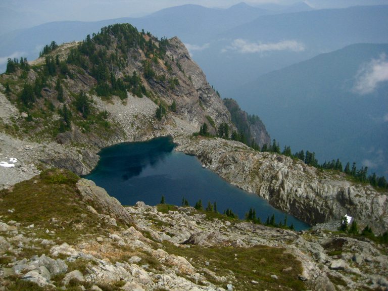 Panorama Lake near Purvis Lake in the Alpine Lakes Wilderness sits on a rocky bench high above the Foss River Valley