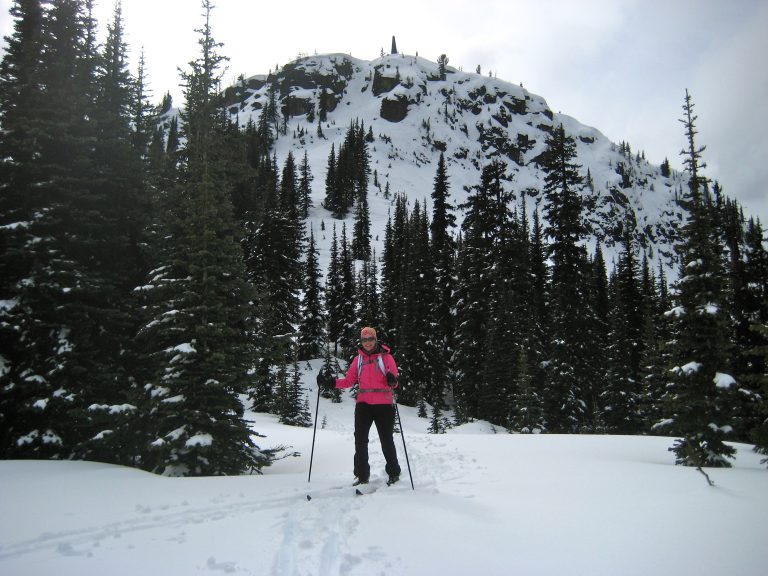 A backcountry skier glides away from Blackwall Peak in Manning Provincial Park