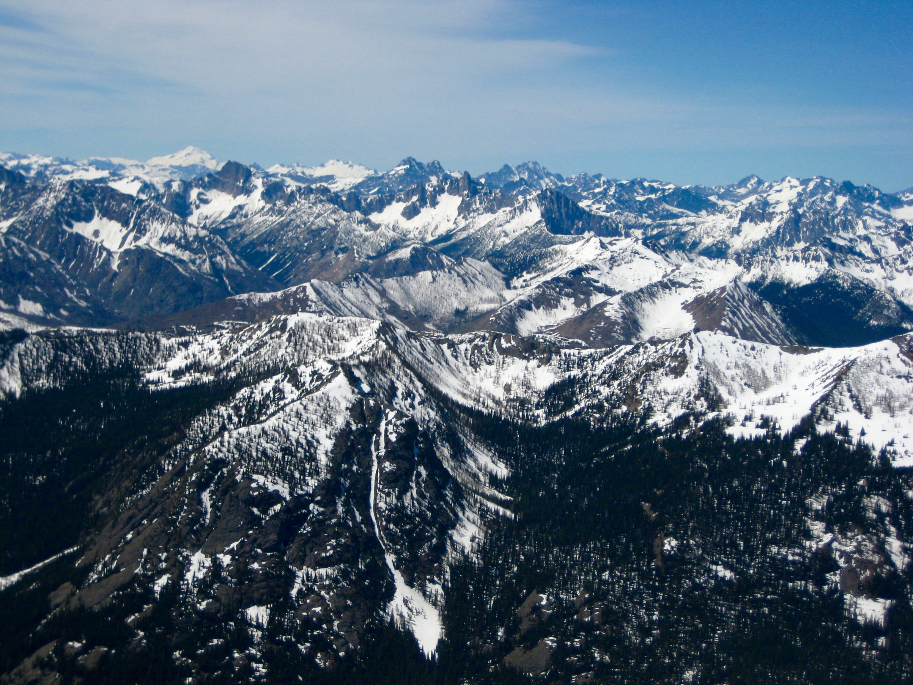 Pano of the snowy Glacier Peak WIlderness as seen from Robinson Mountain in the Pasayten Wilderness