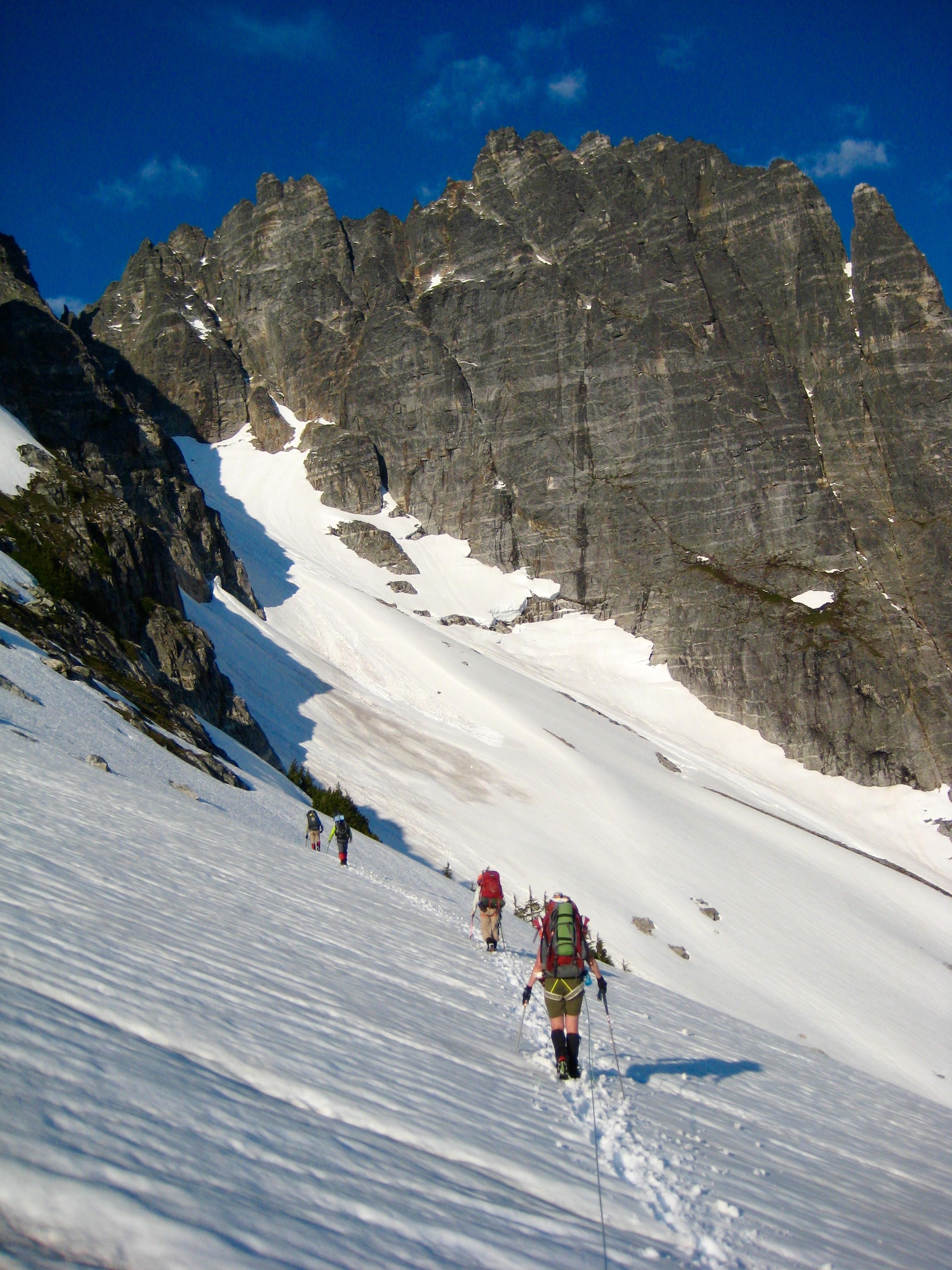 climbers traversing snow fields below Phantom Peak