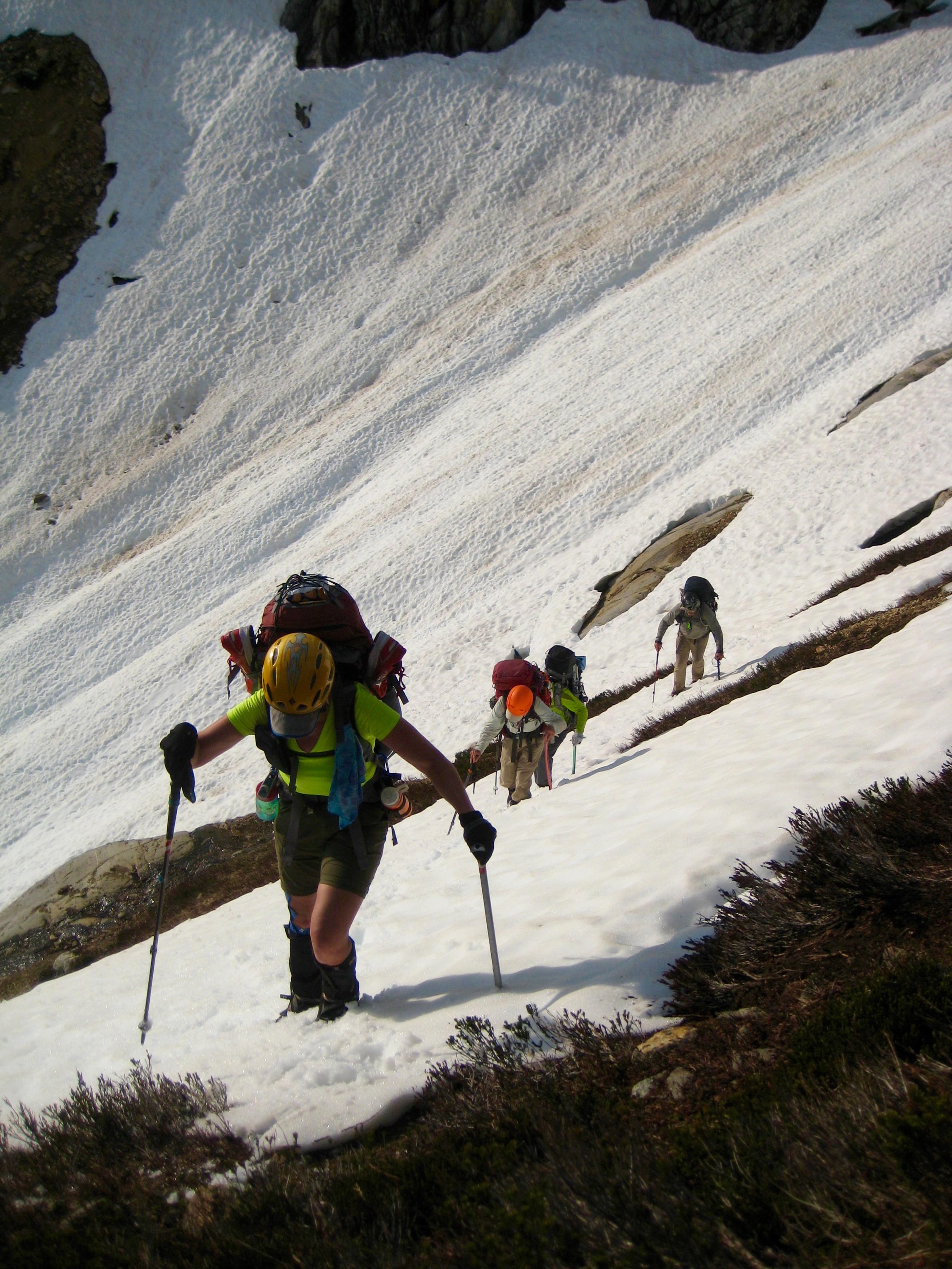 climbers booting up snow field heading to Picket Pass