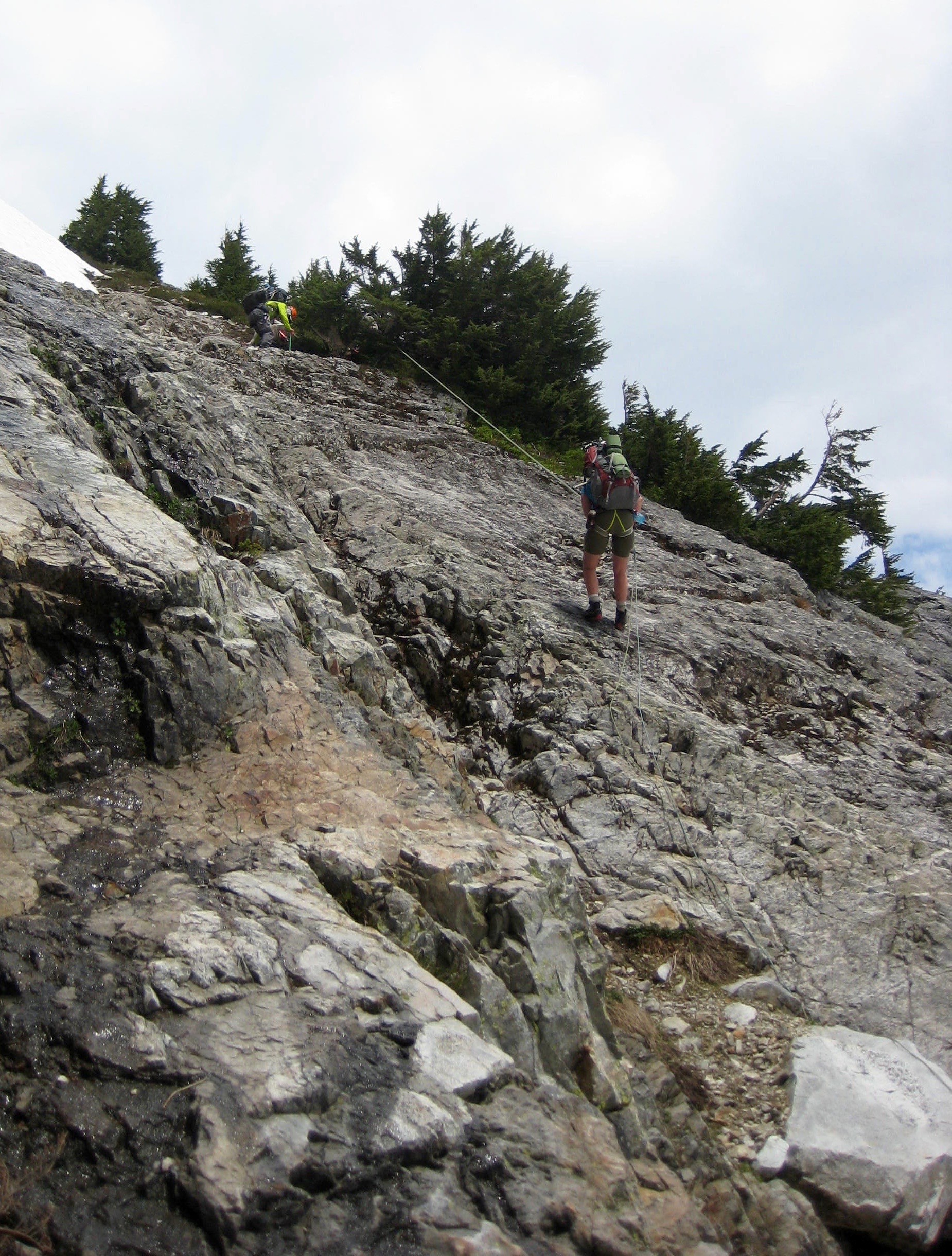 climber rappelling down to the Mustad Glacier