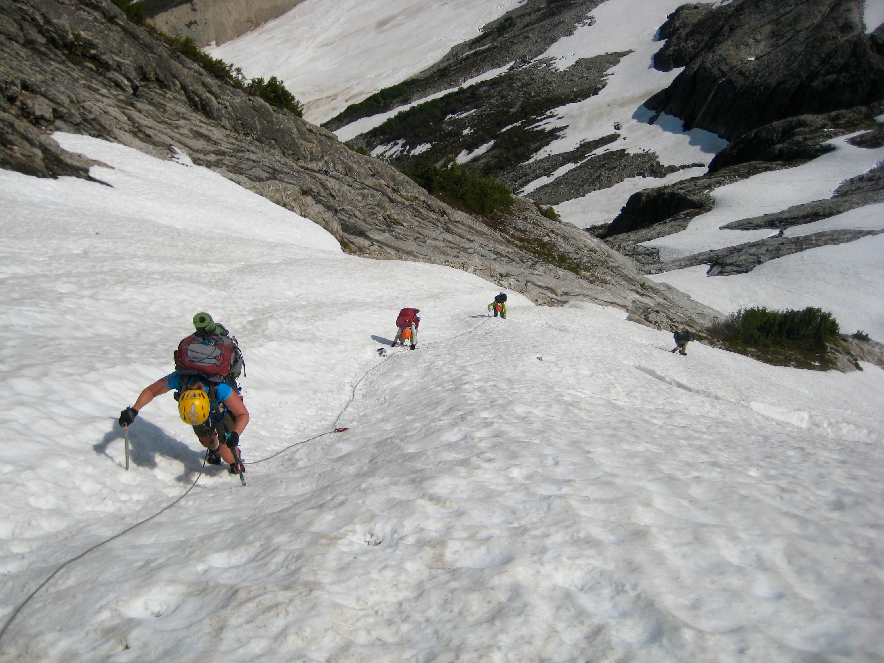 climbers descending Mustard Glacier on the Picket Traverse
