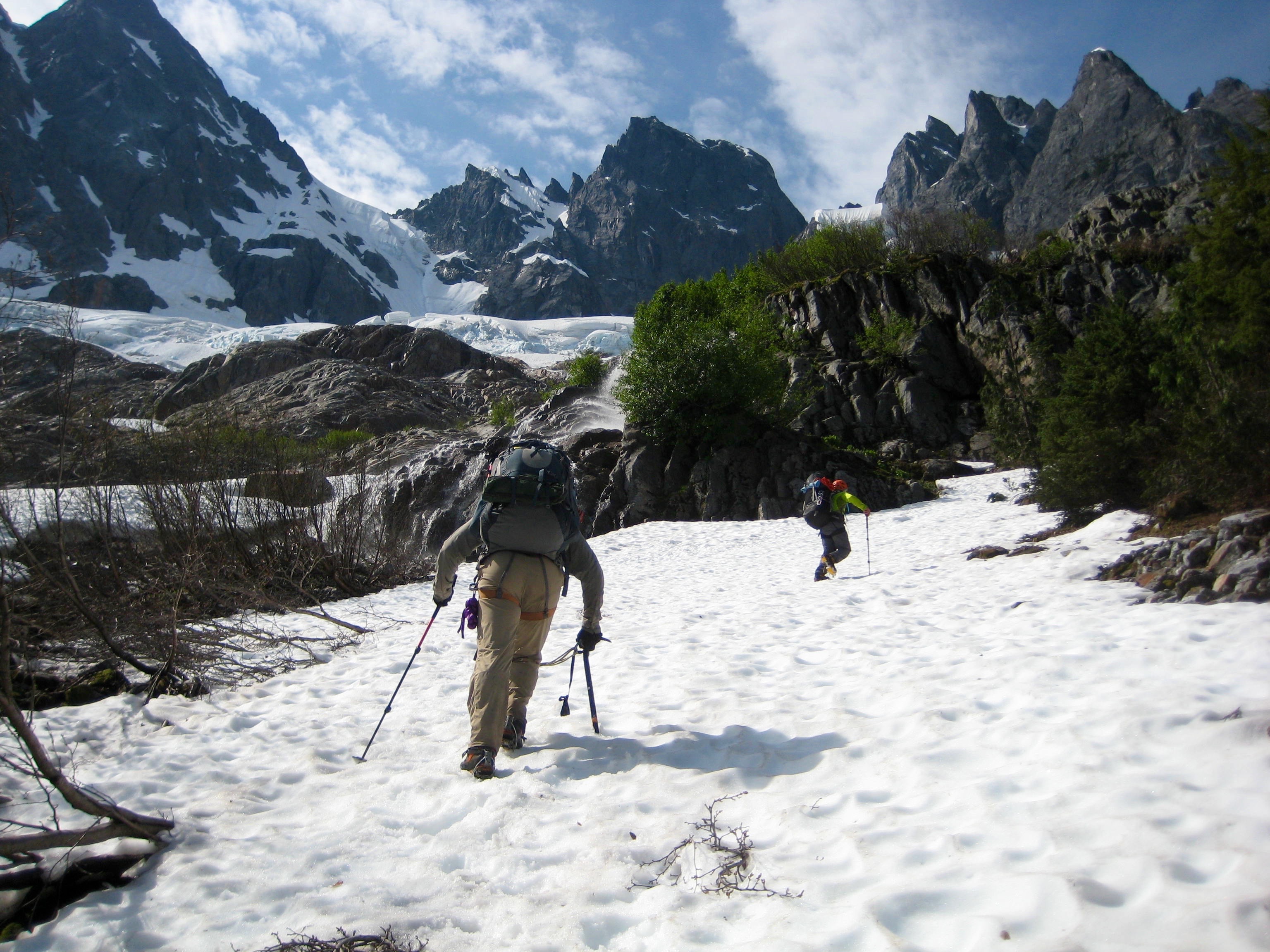 climbers heading up snow field to McMillian Glacier