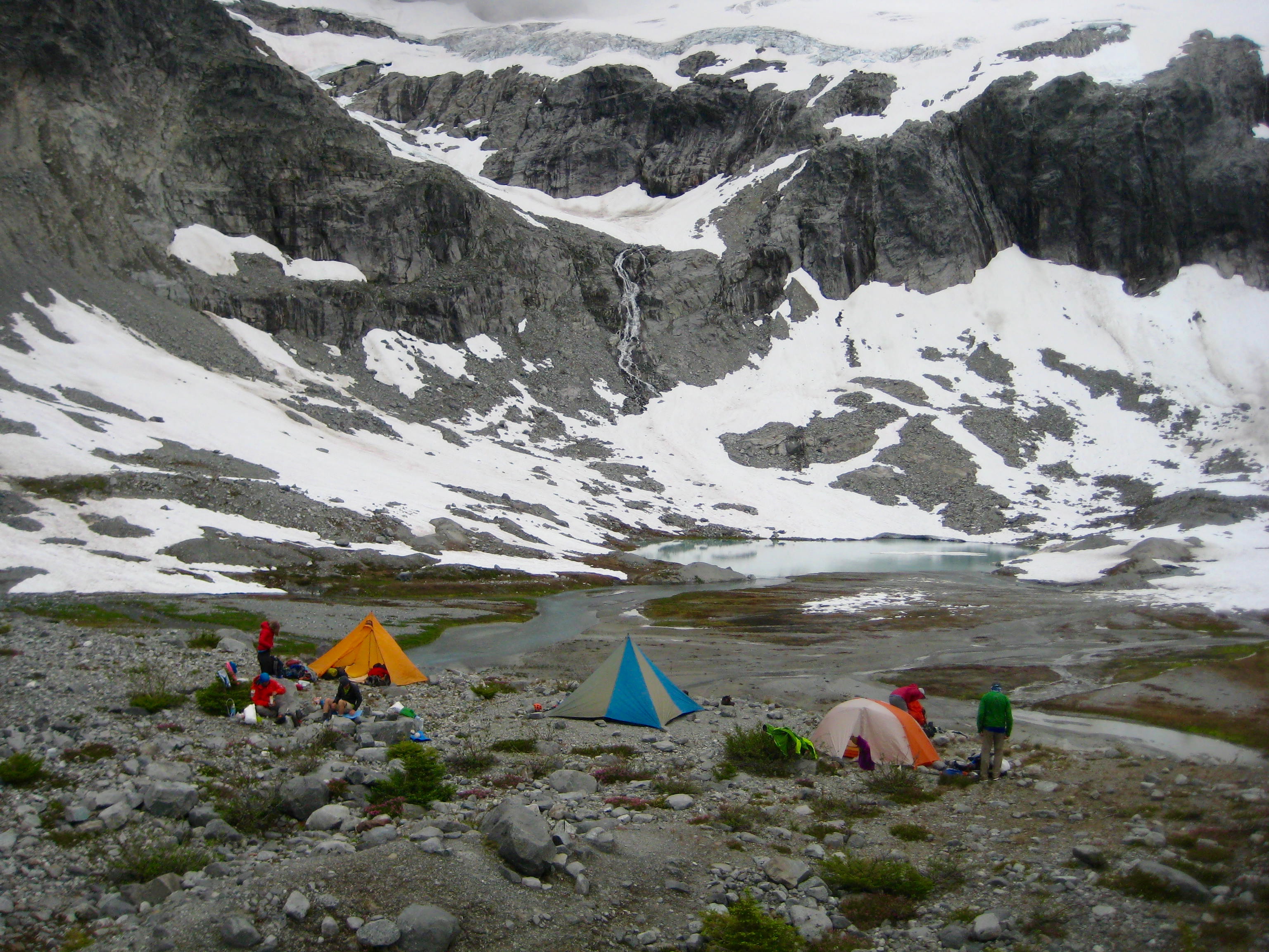 Climbers camp on the moraine at Ouzel Lake below Mt Spickard and Easy Hox