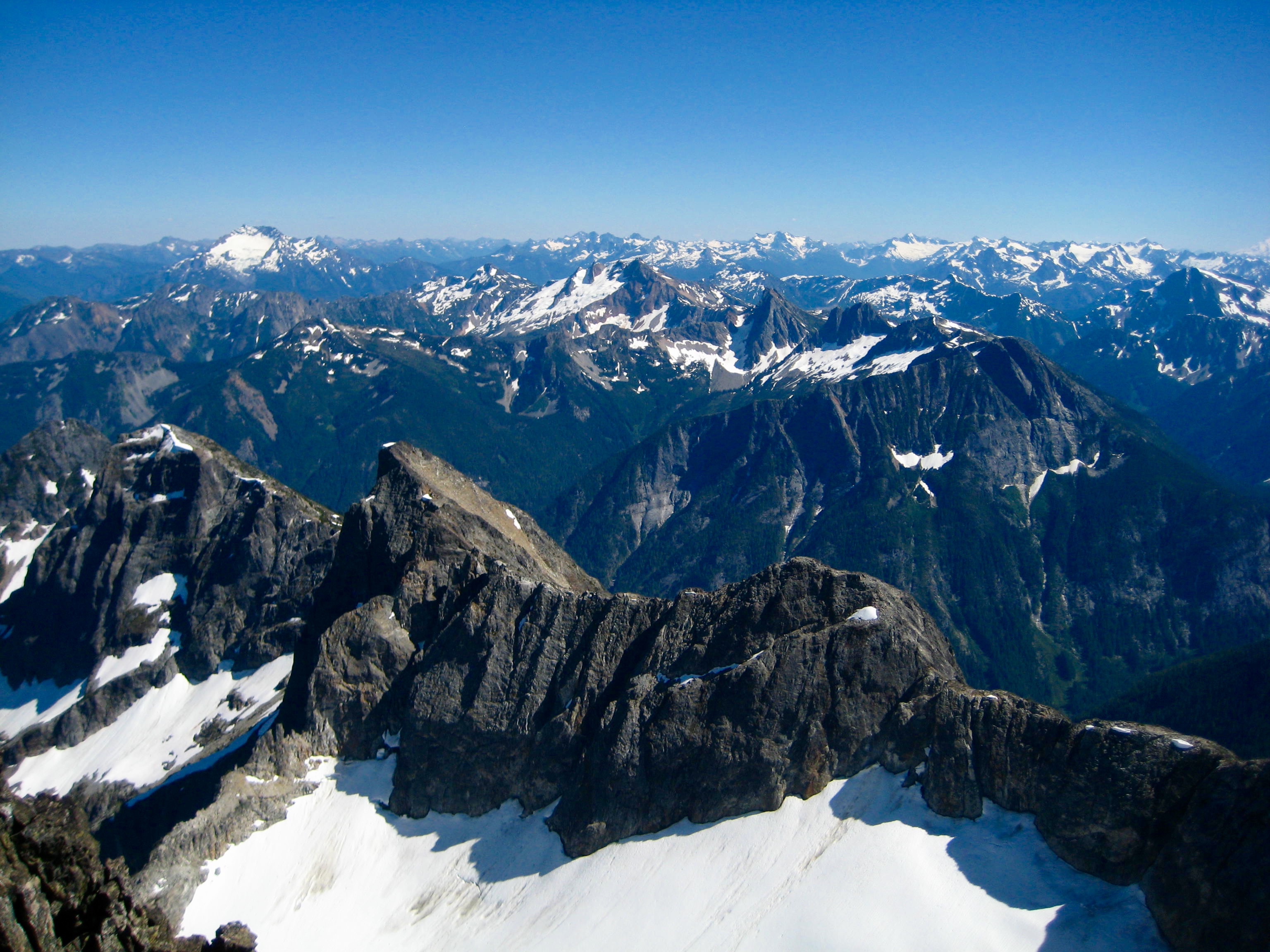 Jack Mountain and Mt Prophet in the North Cascades in the distance with steep rock ridge of Hard Mox Peak in the foreground