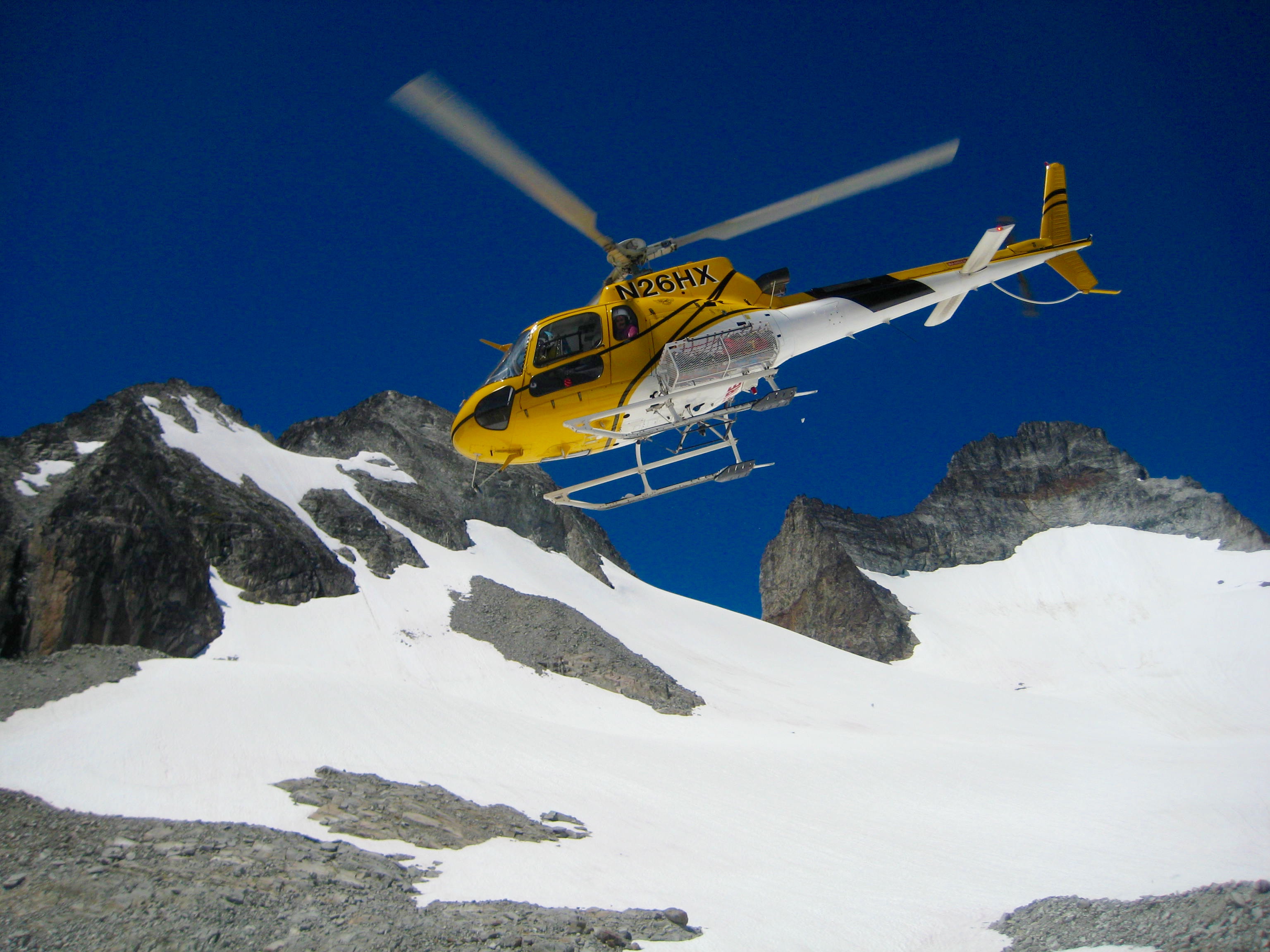 Rescue heliocopter lifted of the Redoubt Glacier