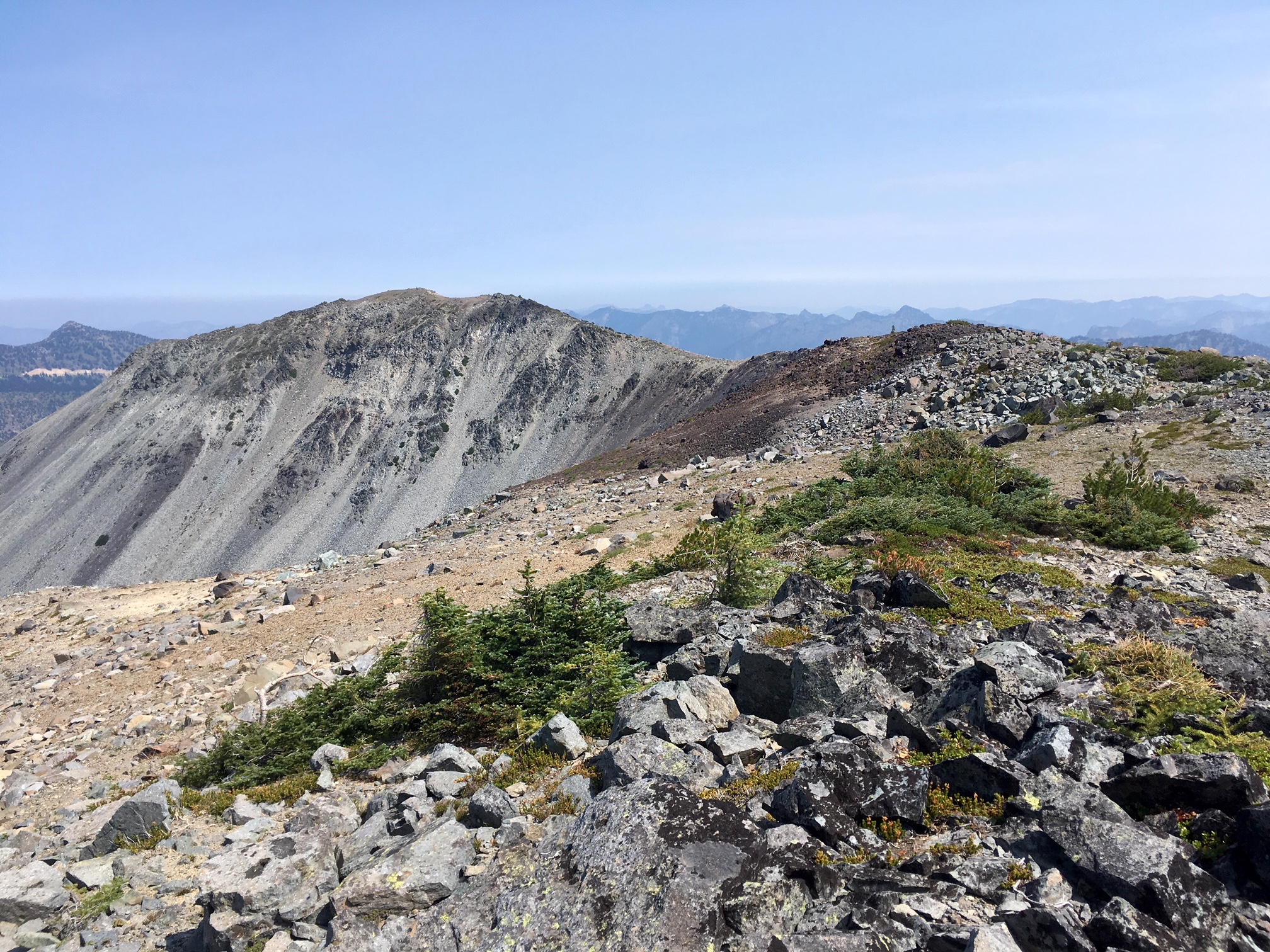A long barren ridge curves out to the summit of Goat Island Mountain in Mt Rainier National Park