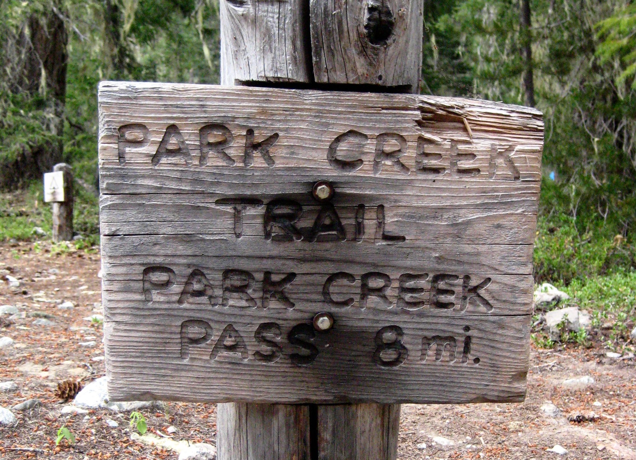 Park Creek Trail wood trail marker enroute to Mt Logan