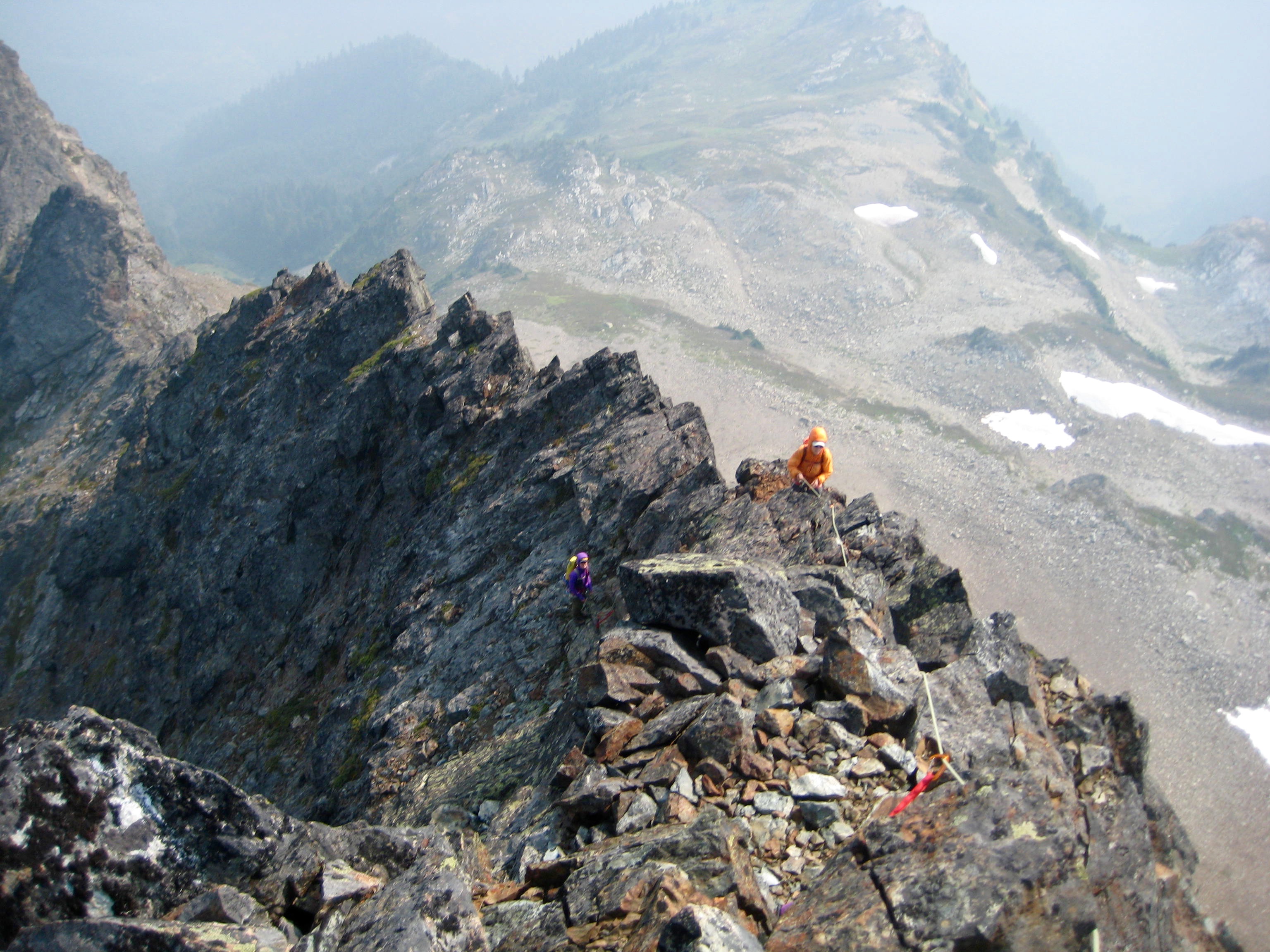 roped mountain climbers scrambling the loose, rocky south ridge of Baby Munday Peak in the Cheam Range