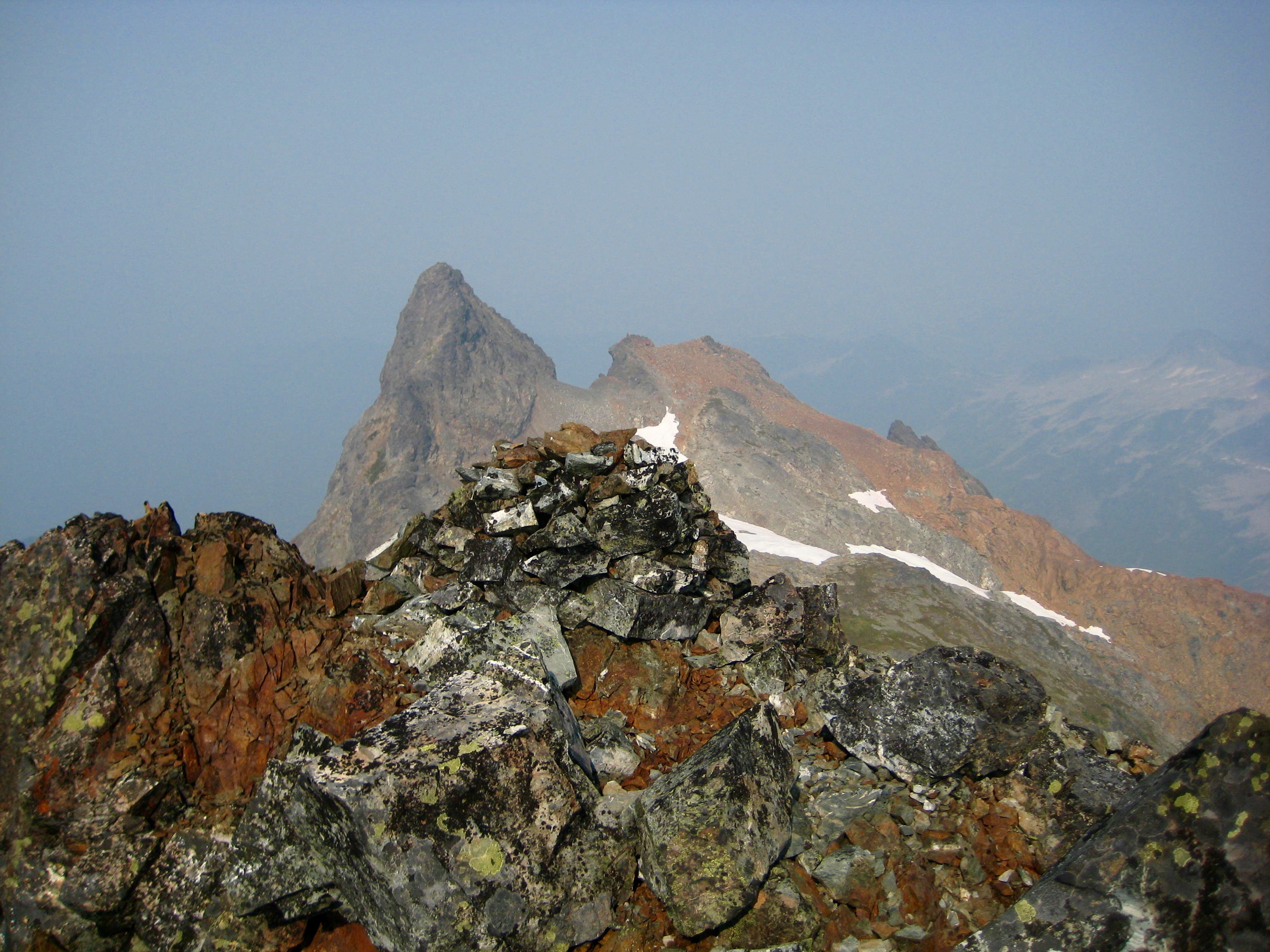 rocky, summit horm of Stewart Peak in the Cheam Range as seen from the summit of Baby Munday Peak