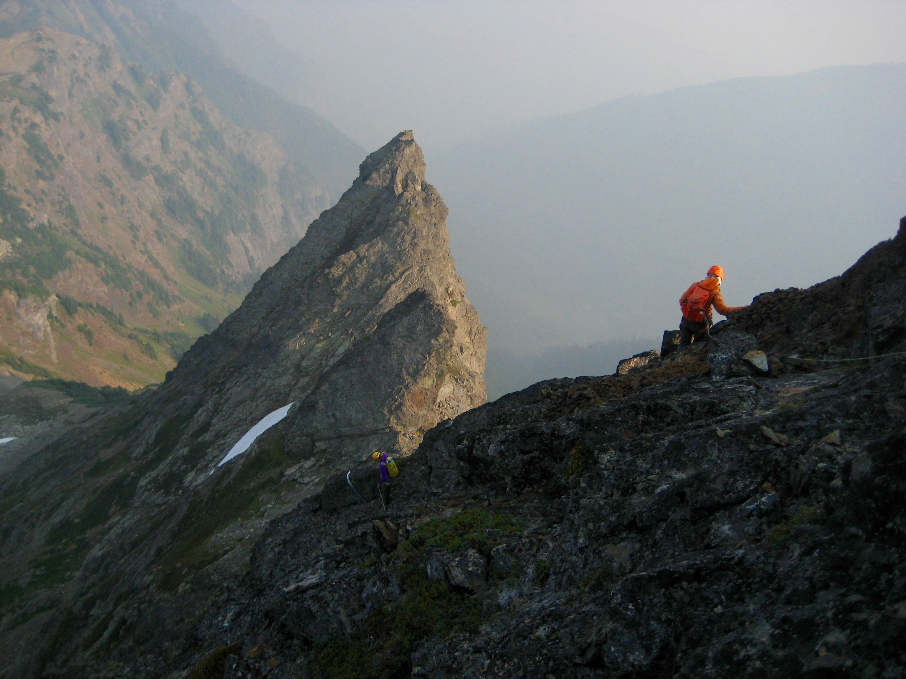 mountain climbers downclimbing the upper south ridge of Baby Munday Peak in the Cheam Range