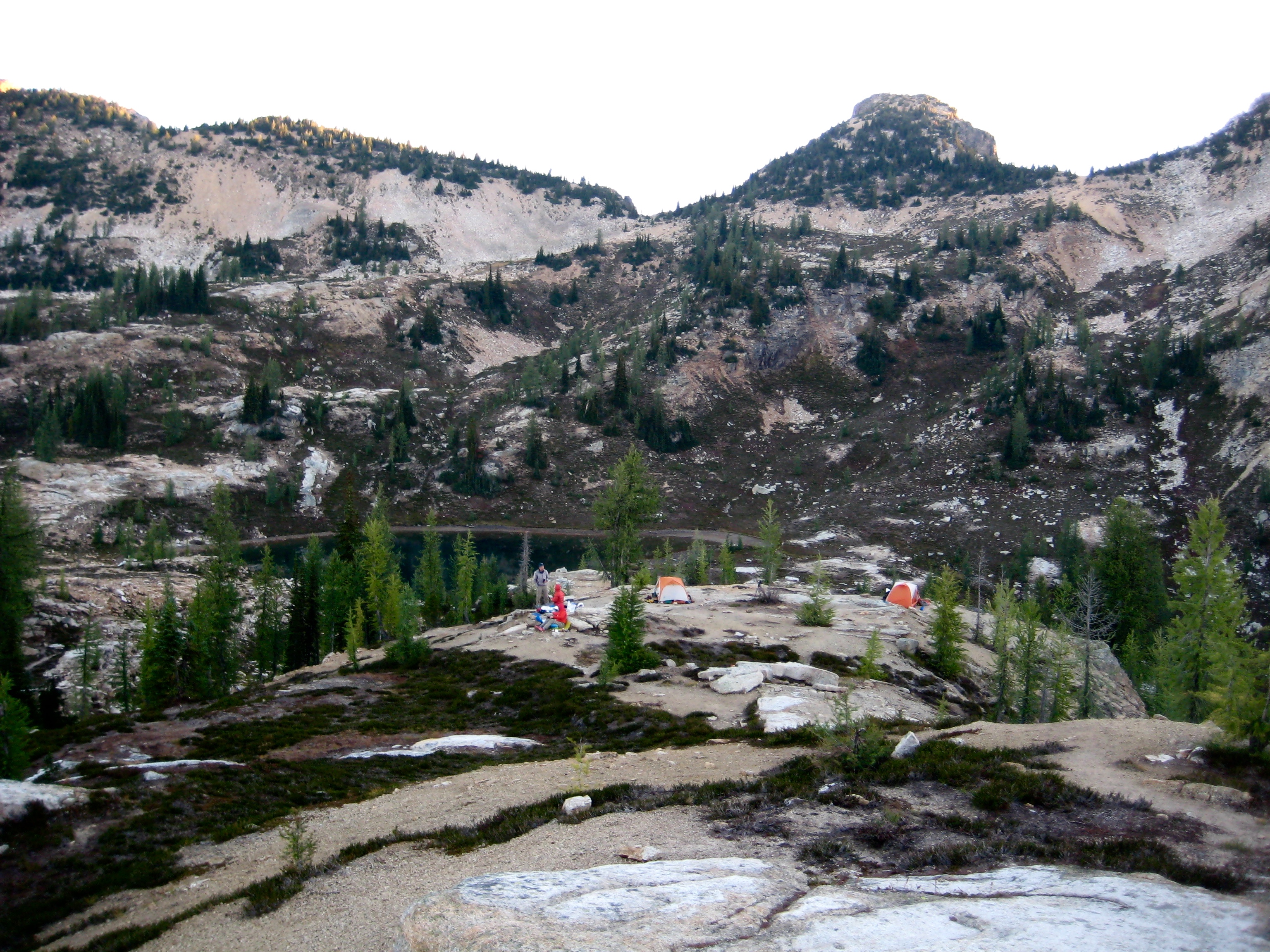 climbers camp on the rock slab ridge above Upper Snowy Lake in the Upper Methow Mountains