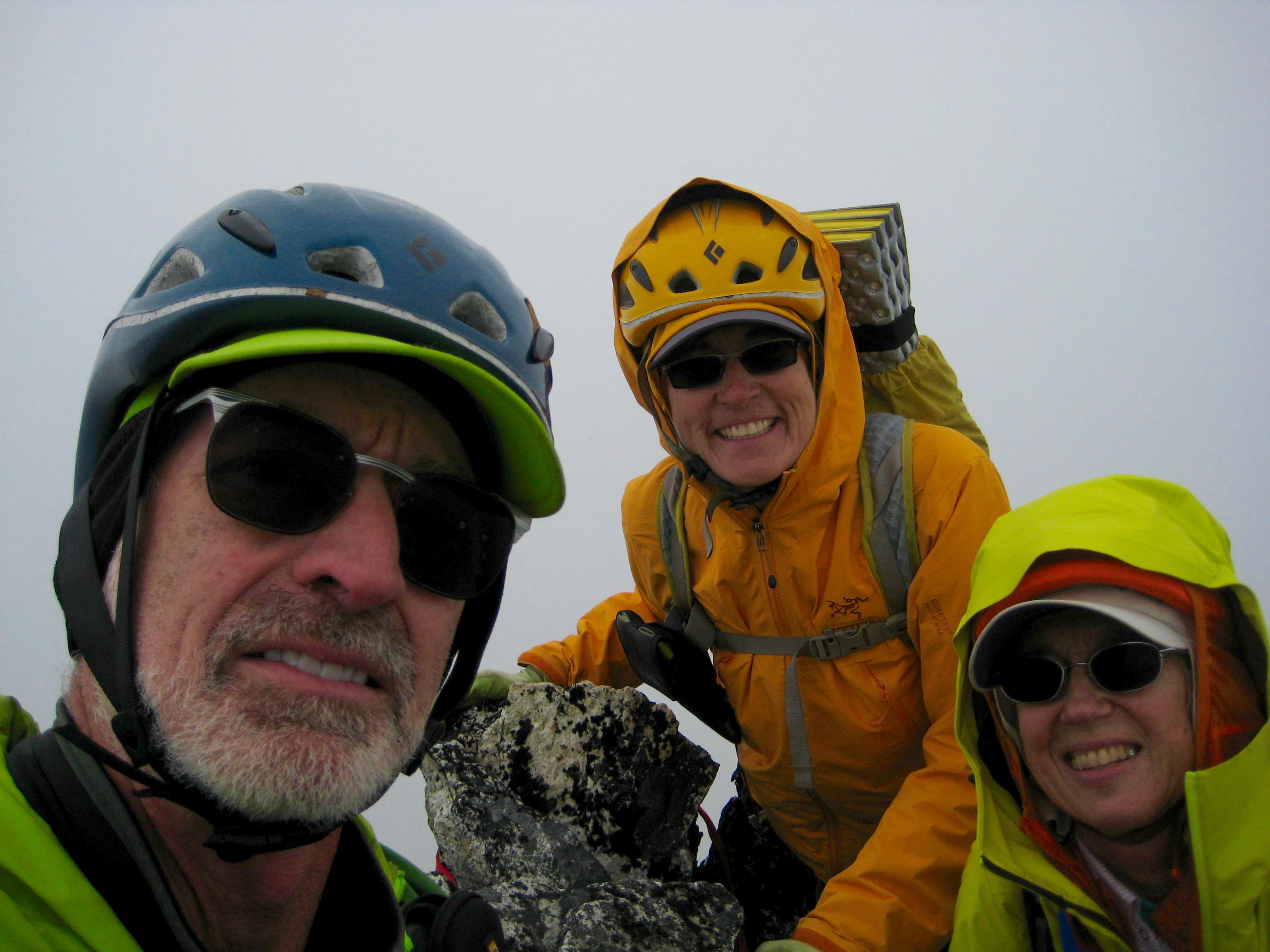 selfie of mountain climbers in the fog on the summit of Bear Mountain in the American Chilliwacks