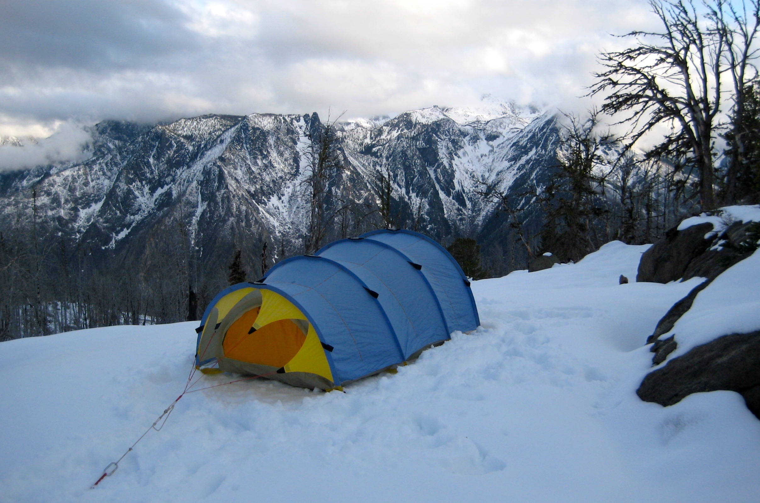 A blue tent is pitched on Icicle Ridge east of Icicle Peak