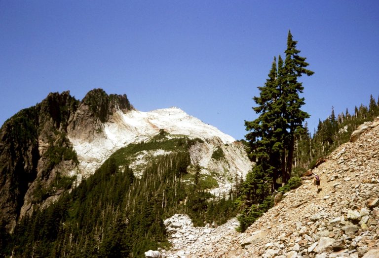 A hiker heads toward Vesper Peak in the Cascade Range