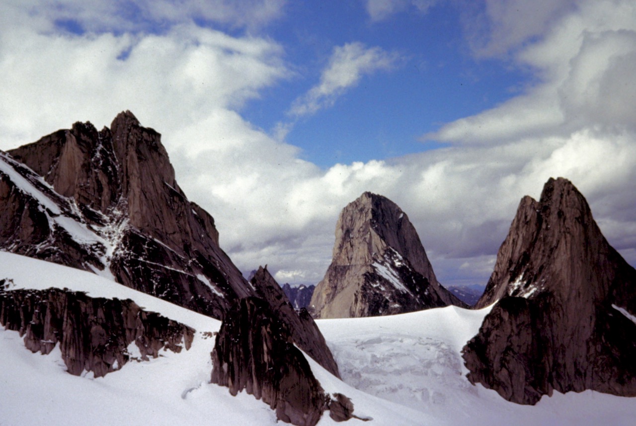 Granite peaks of the Bugaboo Mountains jut through a glacial ice cap