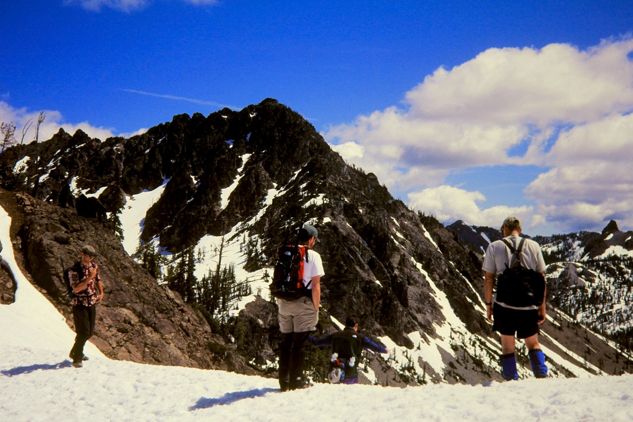 Hikers looking at Bills Peak while standing at Iron Pass
