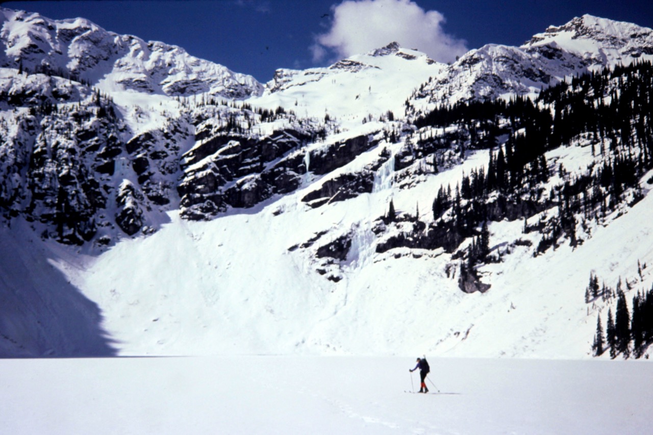 A backcountry skier crosses frozen Rainy Lake during the Rainy--Birthday Ski Traverse