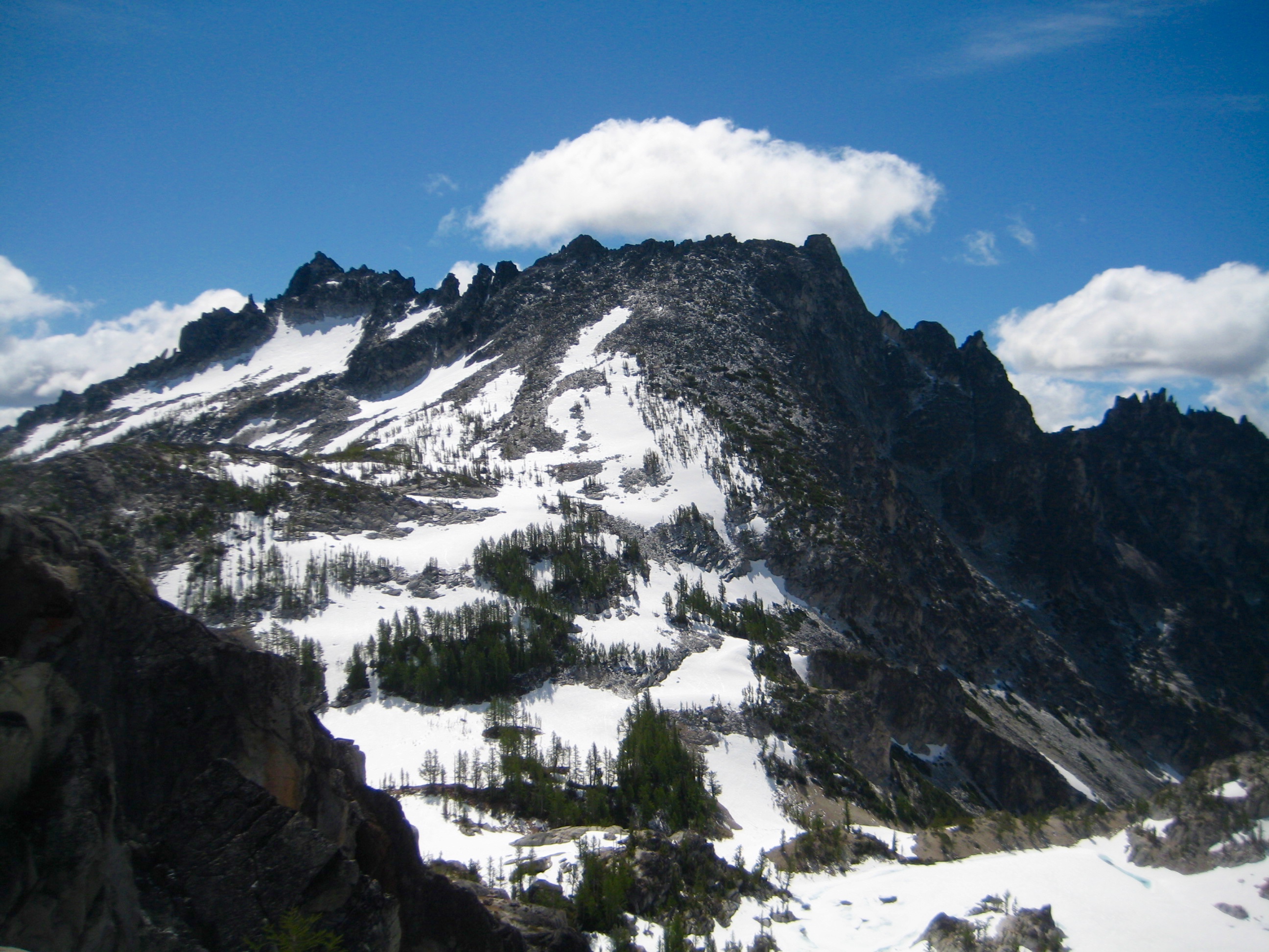 McClellan Peak stands above Crystal Lake in the heart of The Enchantments in Alpine Lakes Wilderness