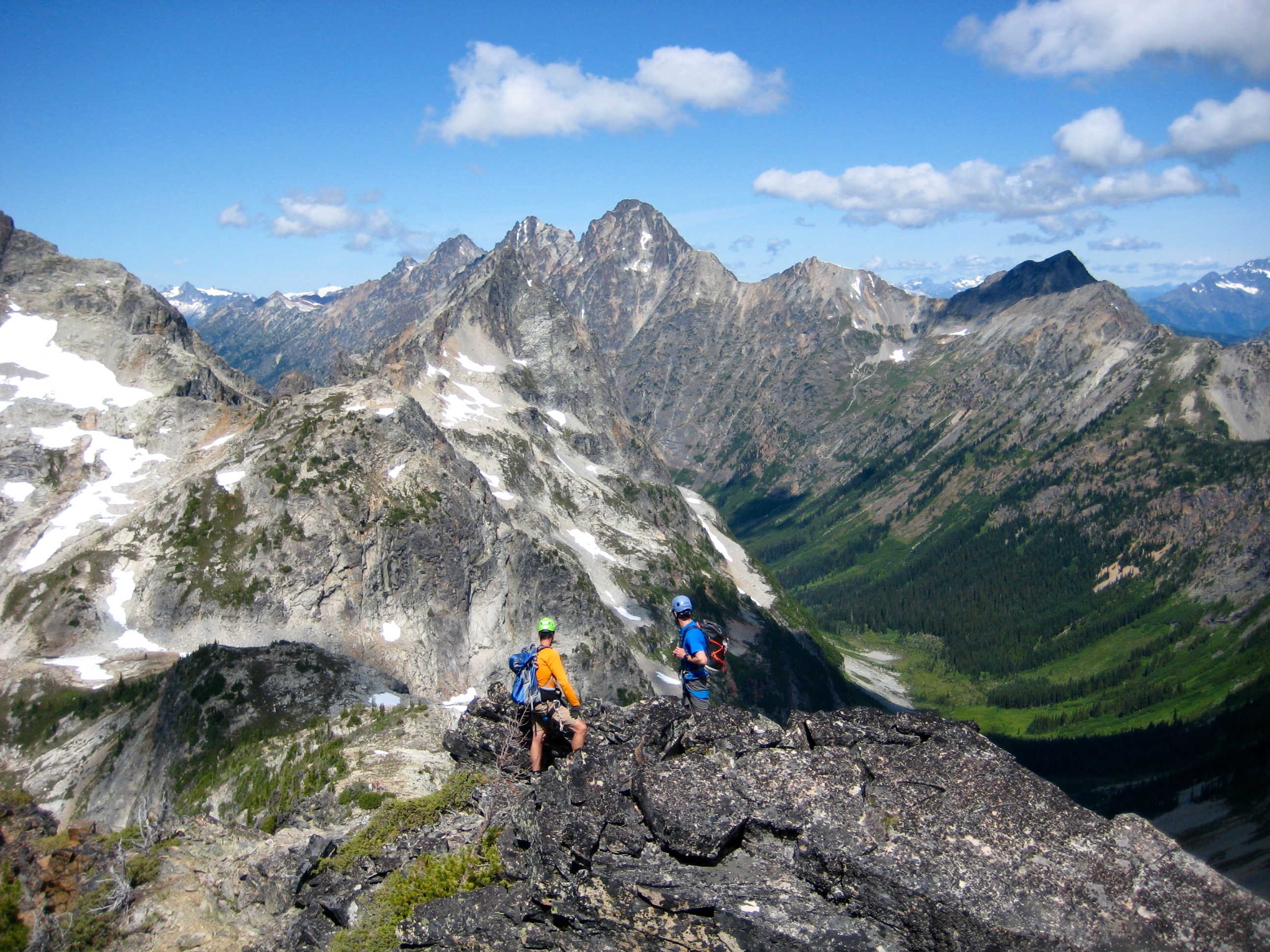 Climbers high on the Northwest Ridge of Fisher Peak looking at Ragged Ridge