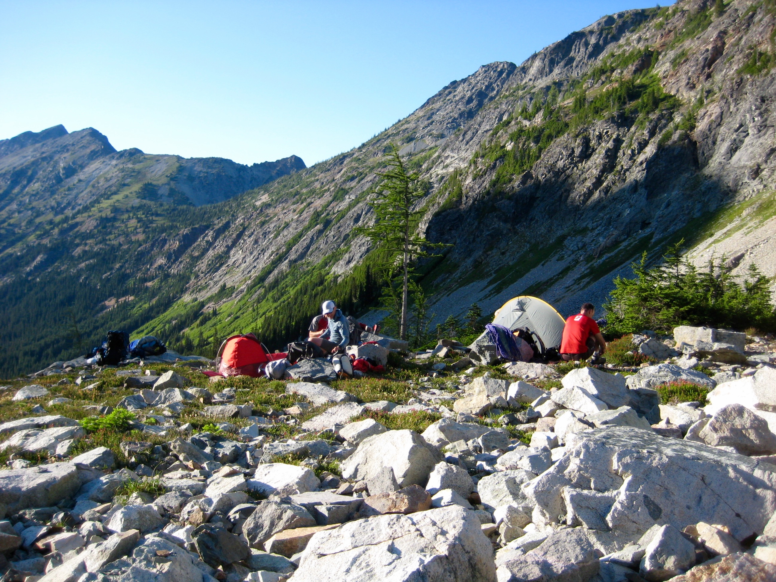Climbers setting up camp overlooking Fisher Creek Basin